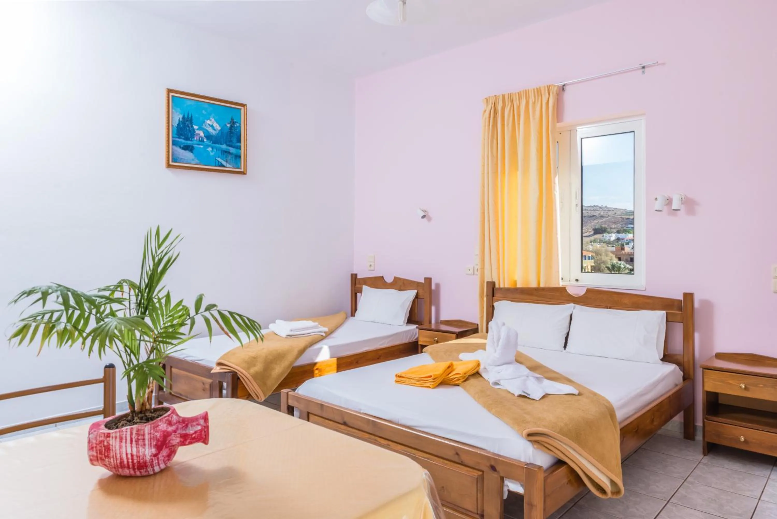 Bed in Arsinoi Studios and Apartments