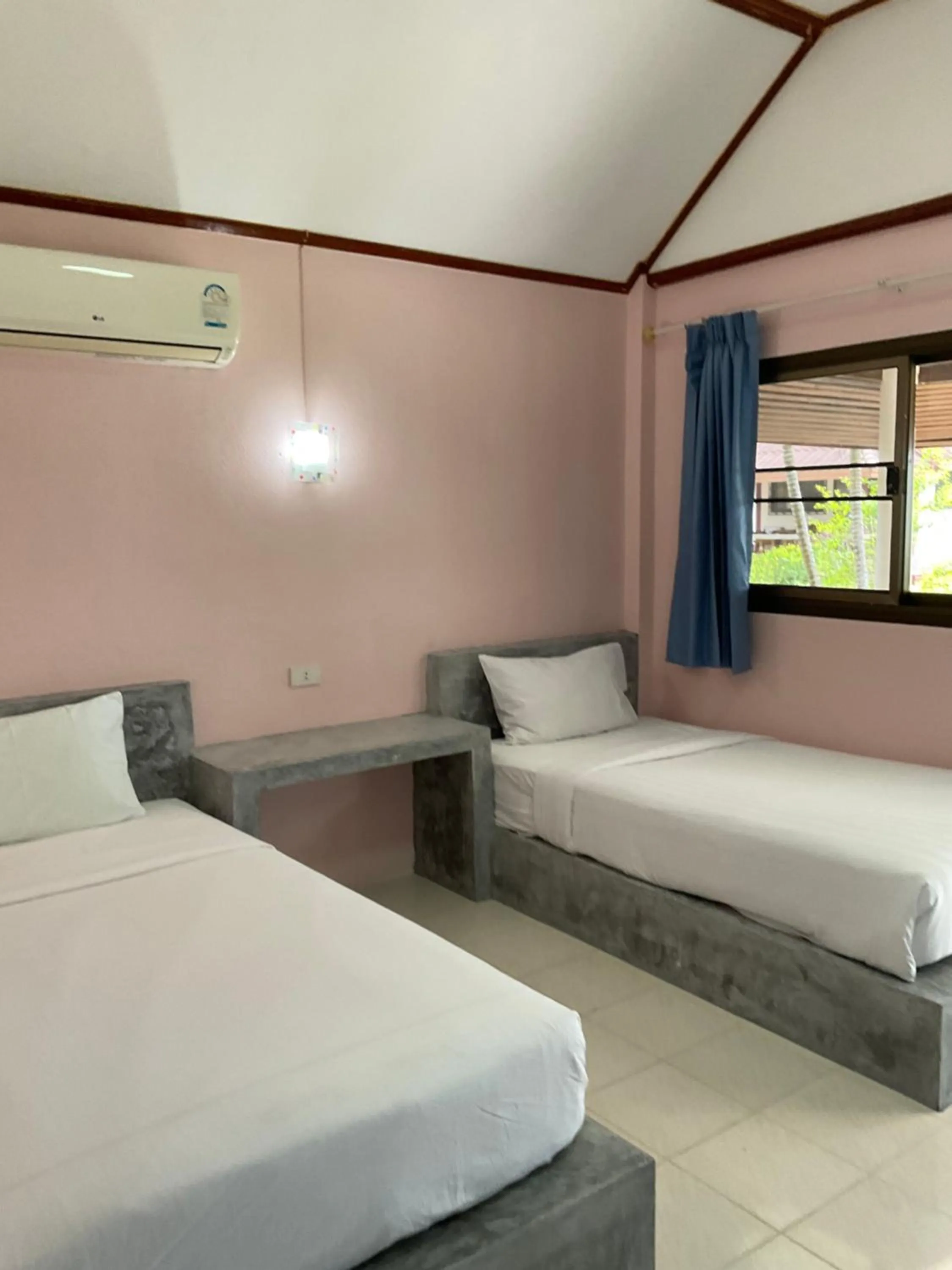 Bed in Island Spa Resort