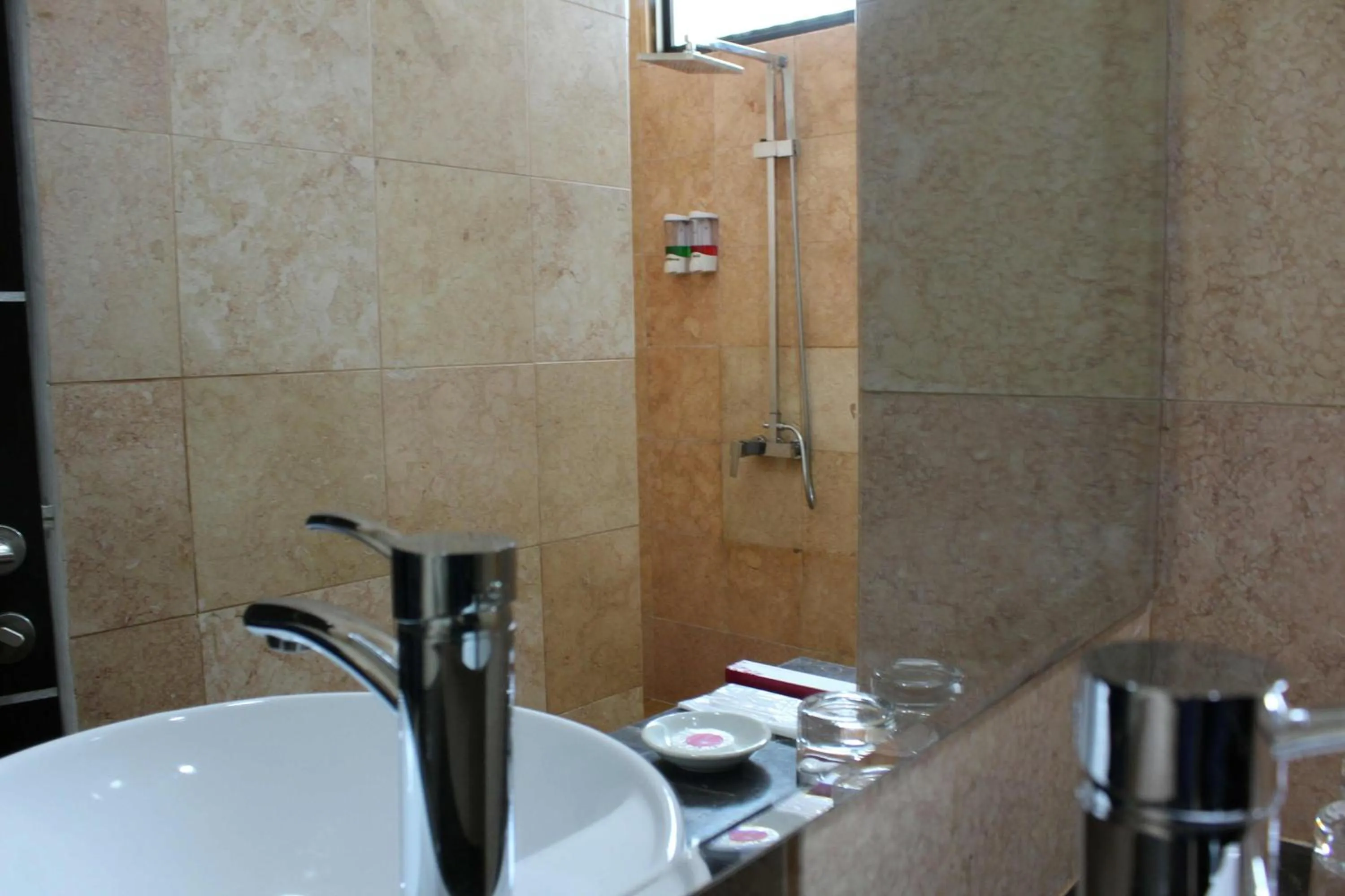 Bathroom in The Centro Hotel & Residence By Orchardz