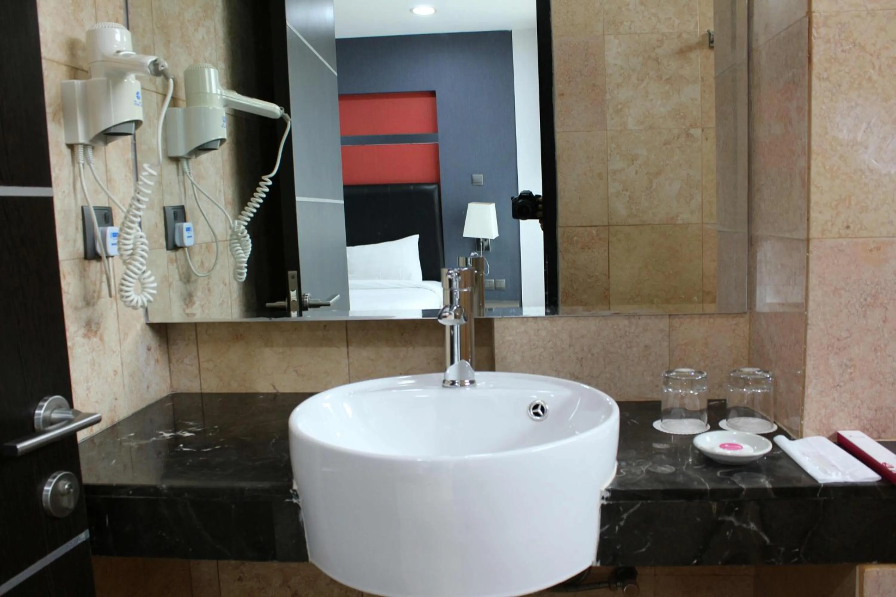 Bathroom in The Centro Hotel & Residence By Orchardz