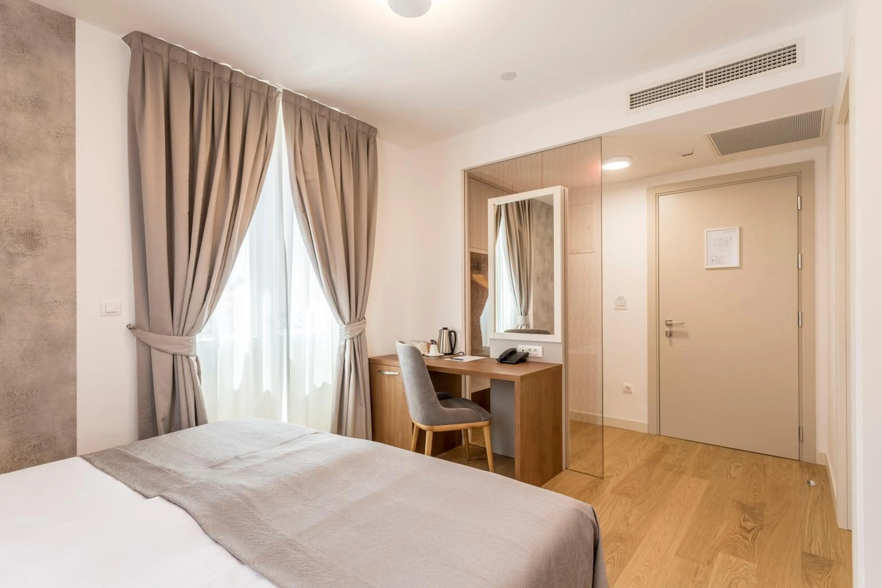 Photo of the whole room, Bed in Residence Stine