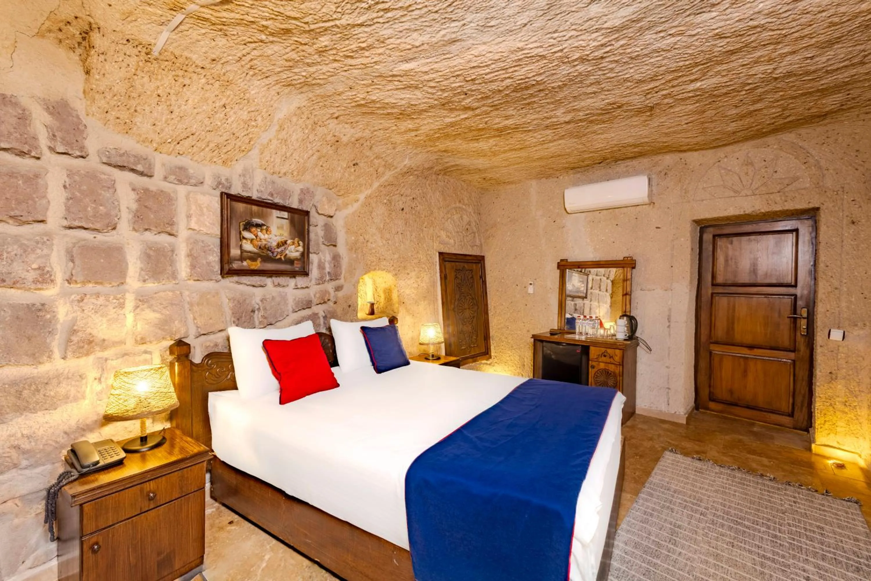 Bed in Grand Elite Cave Suites