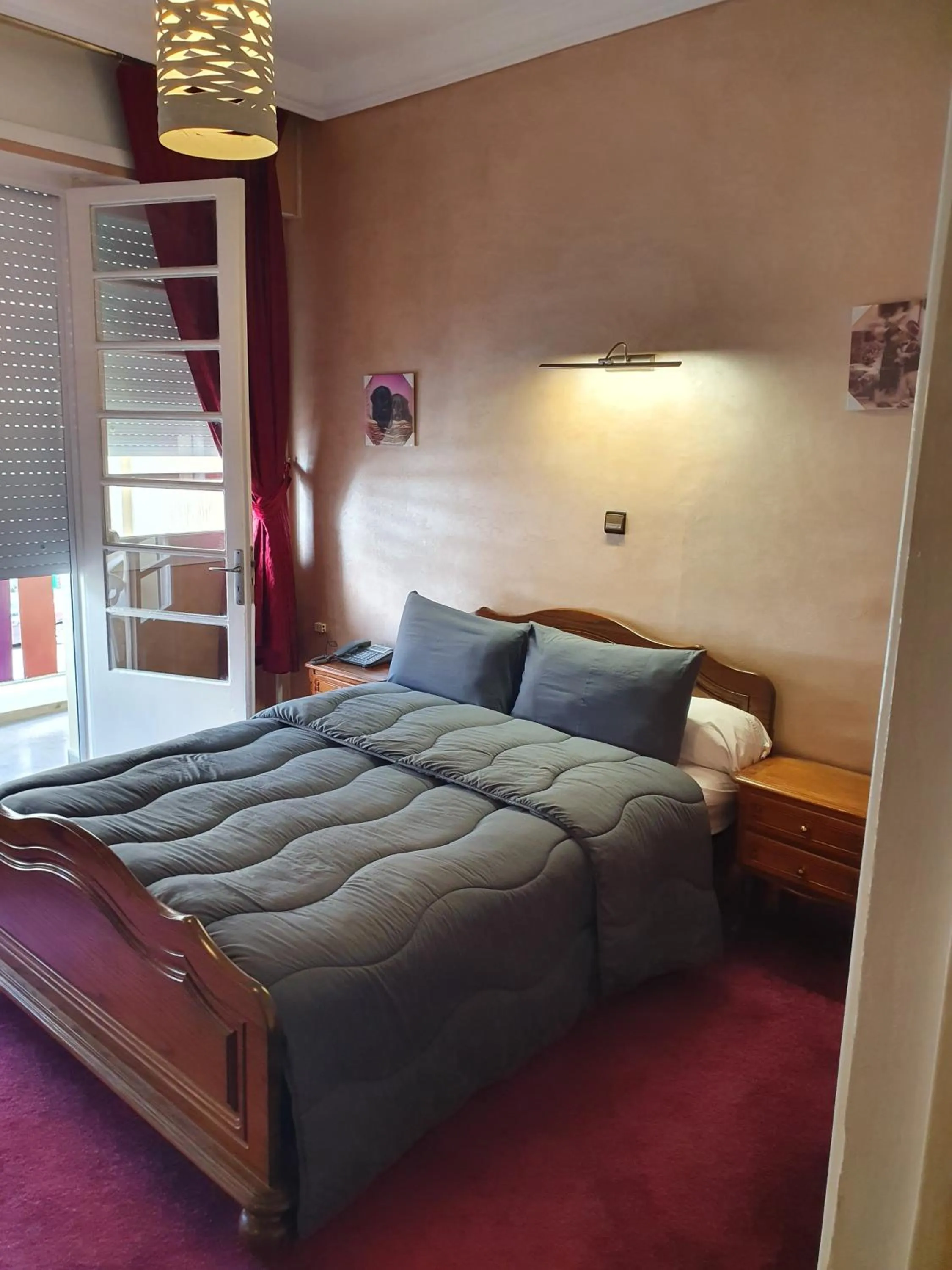 Bed in Ambassy Hotel