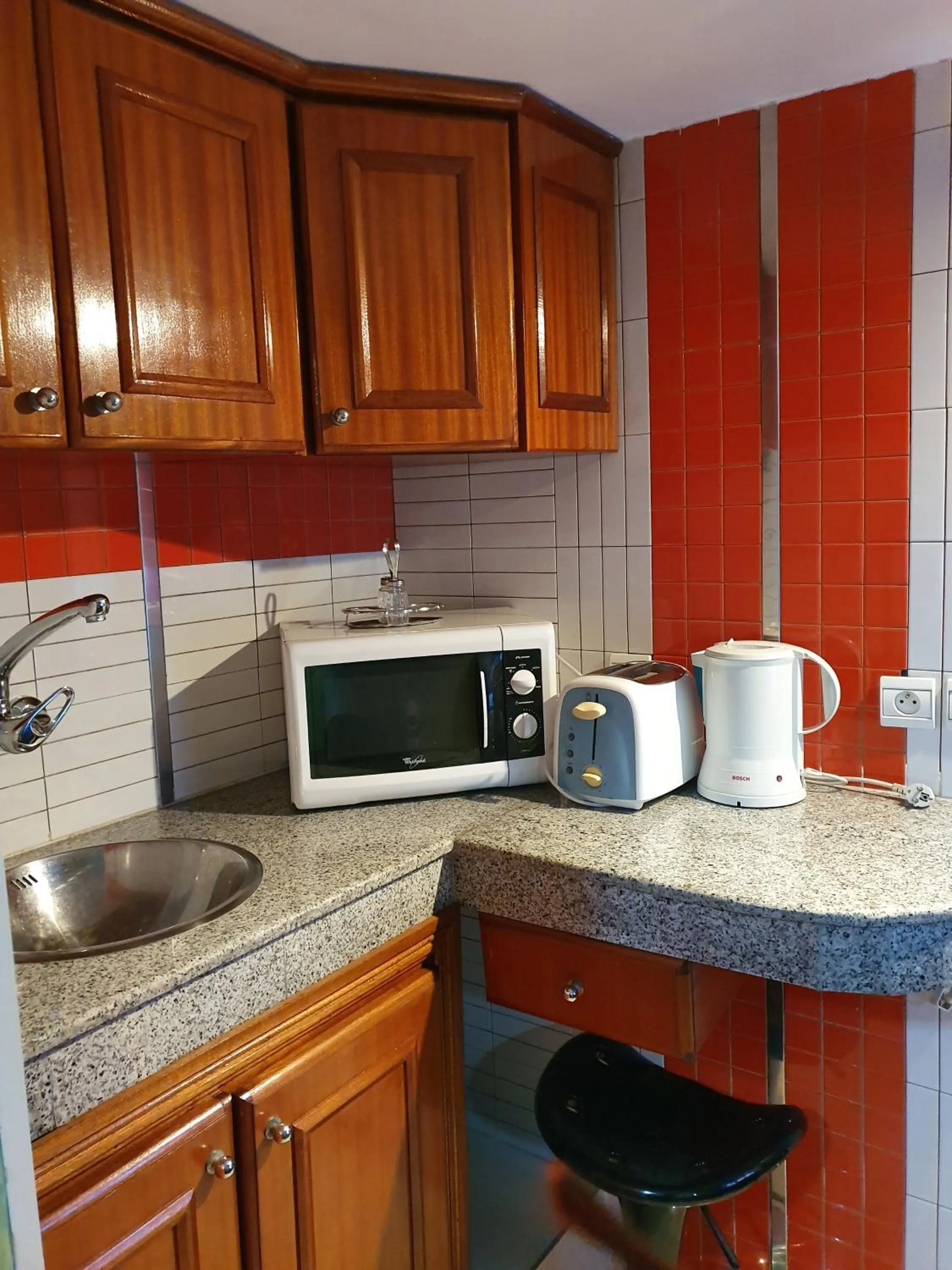 Kitchen or kitchenette in Ambassy Hotel
