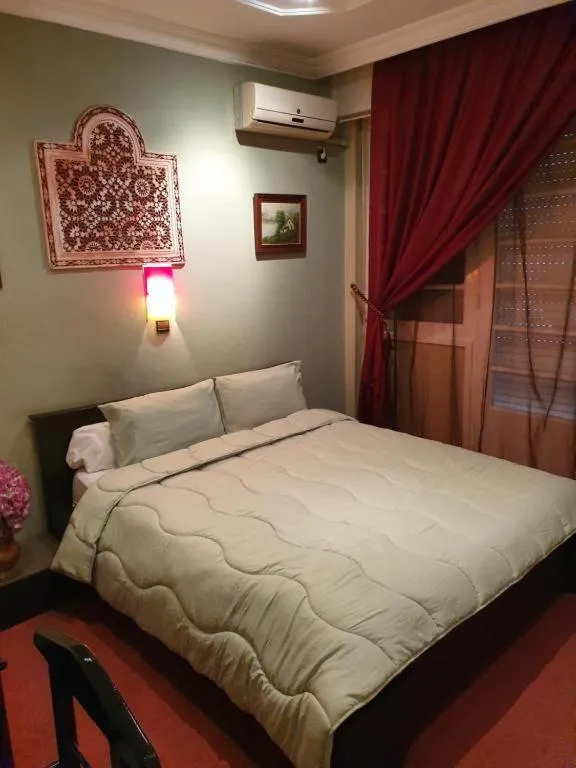 Bed in Ambassy Hotel