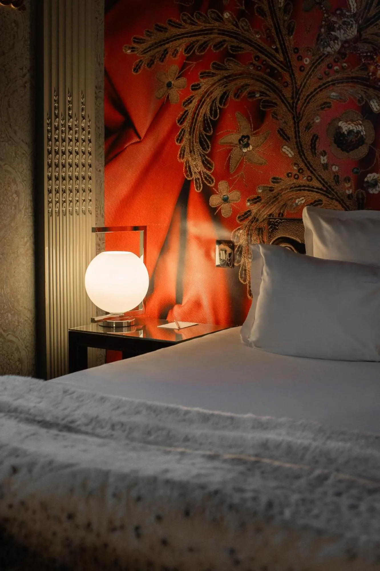 Decorative detail, Bed in Hôtel du Petit Moulin, Haute Couture hotel by Lacroix