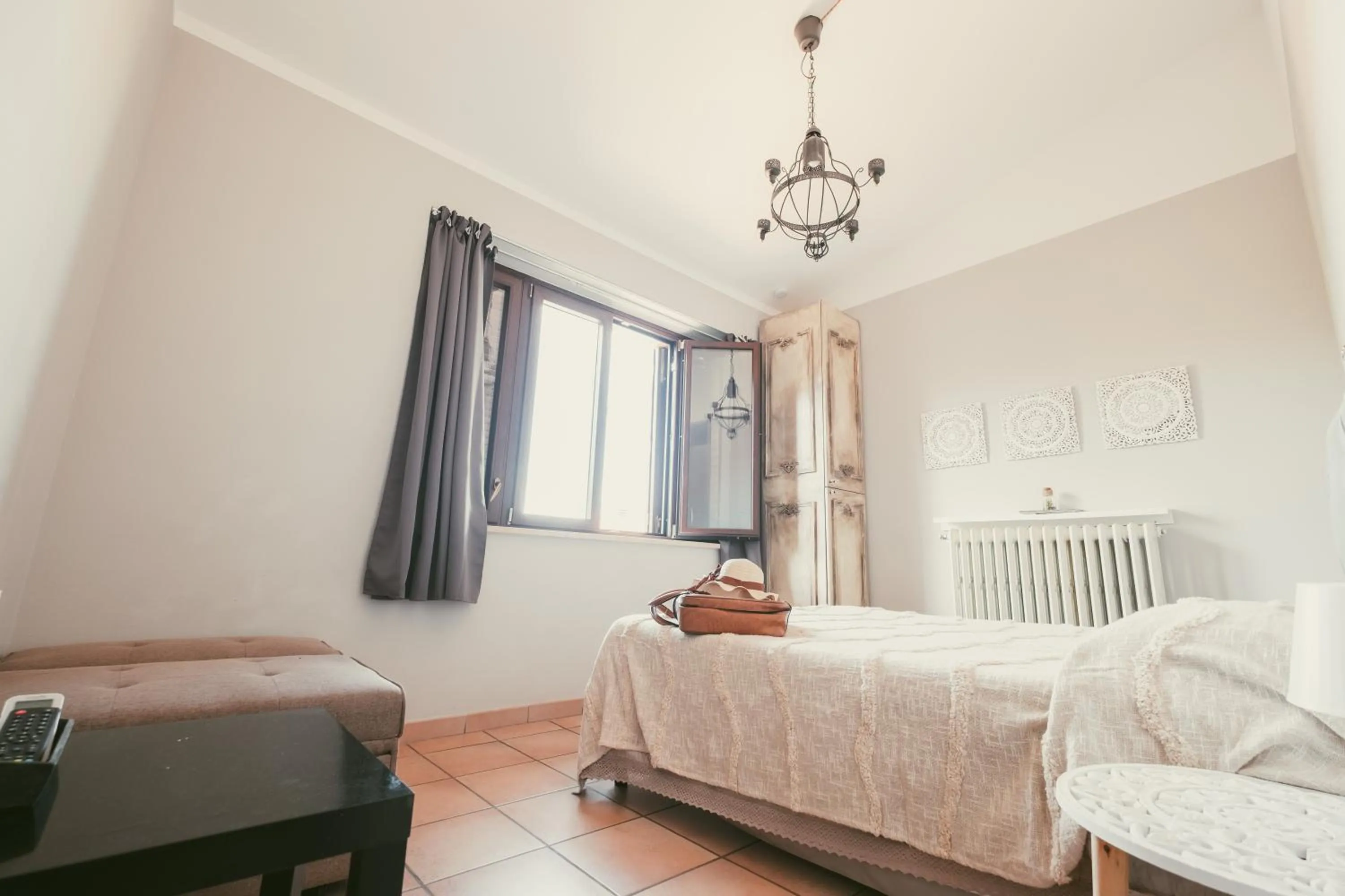 Photo of the whole room, Bed in Palazzetto del Pittore in San Quirico d'Orcia