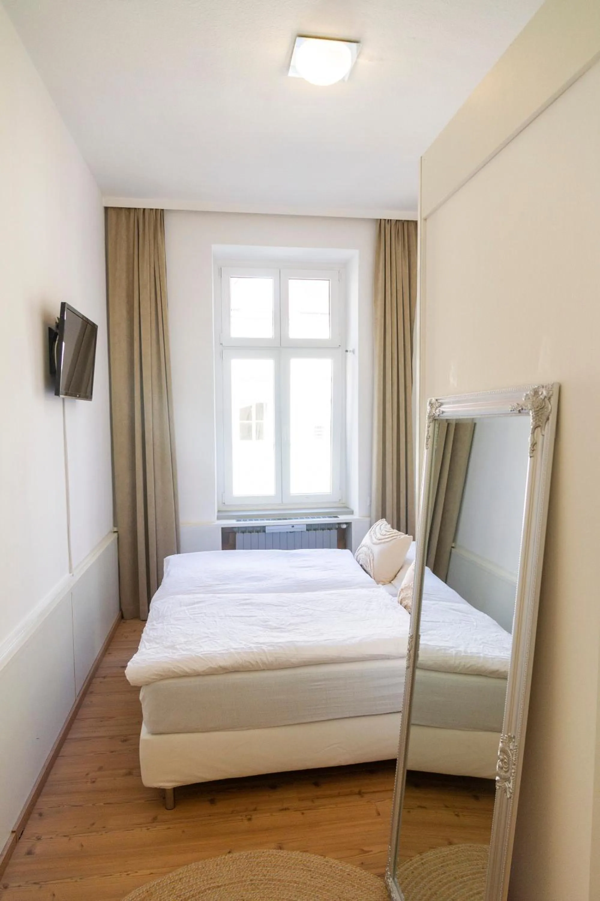 Bed in KIBI Rooms self check-in