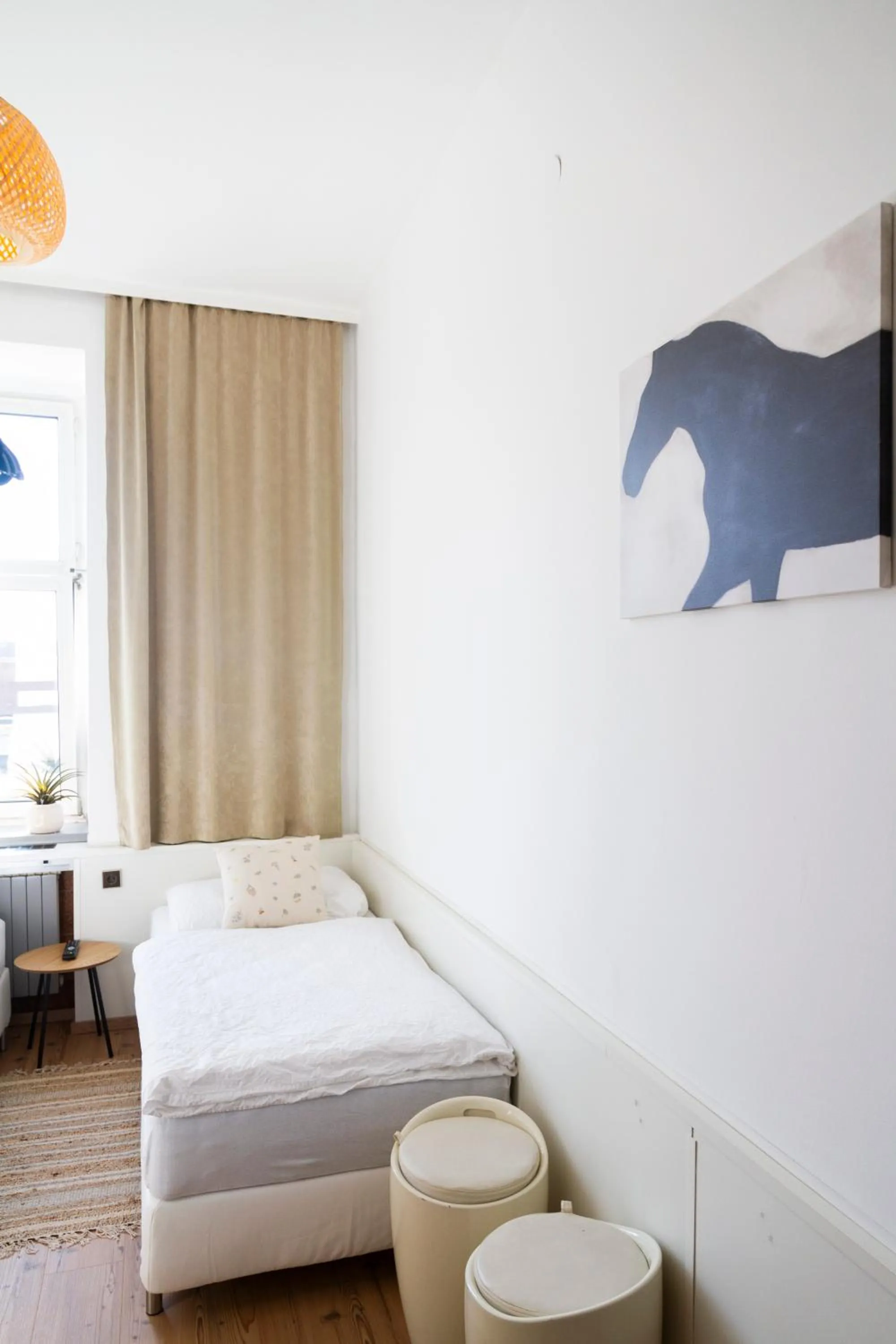 Bed in KIBI Rooms self check-in