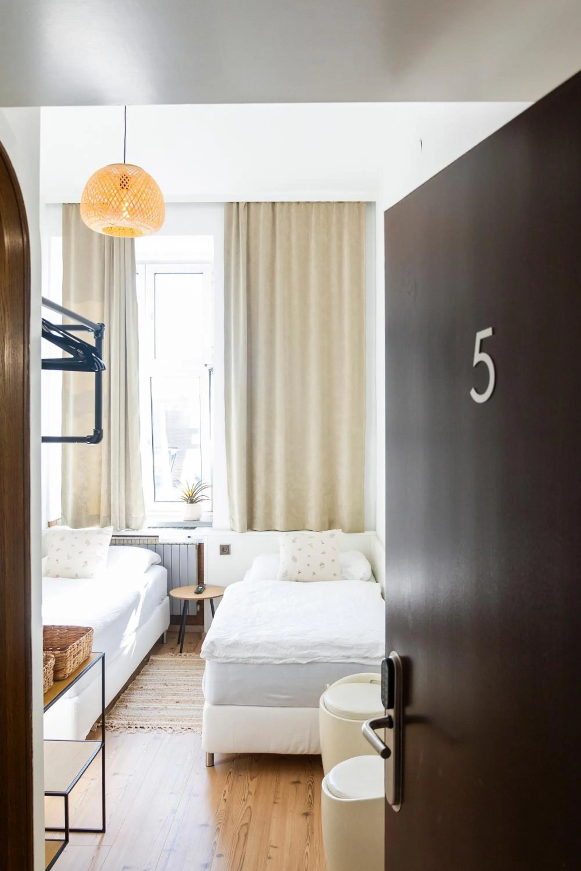 Bed in KIBI Rooms self check-in