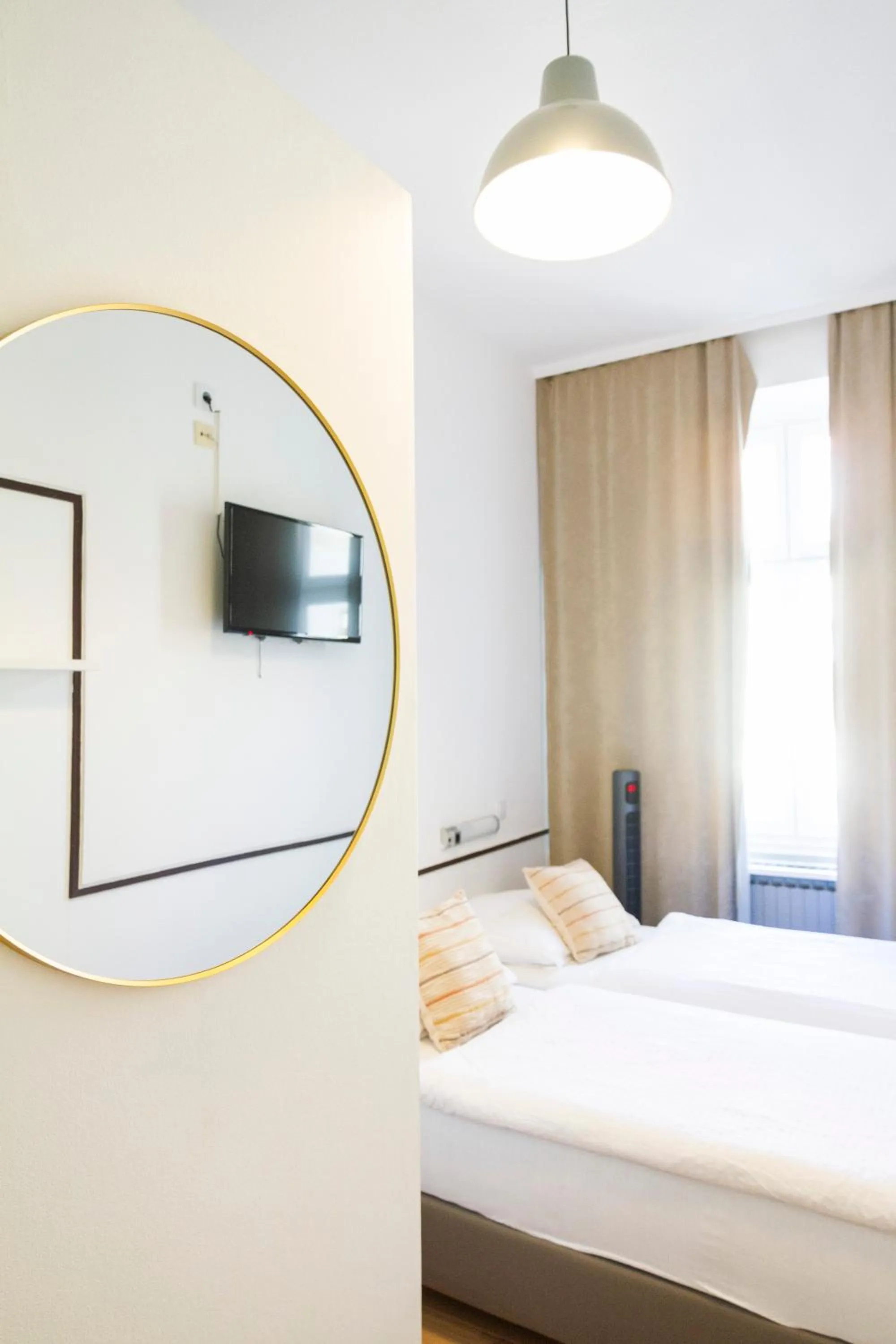 Bed in KIBI Rooms self check-in