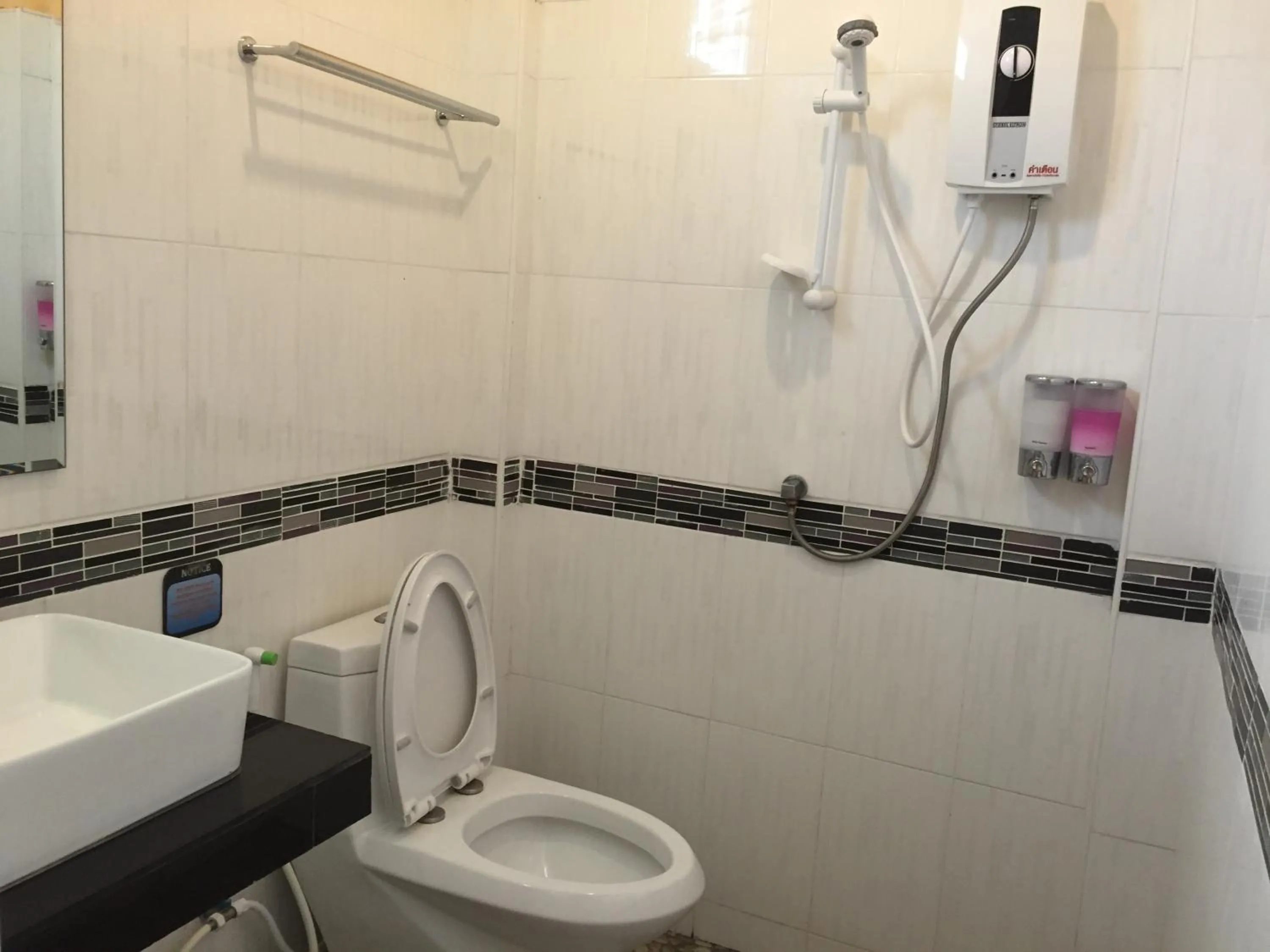 Shower in Baan Suan Ta Hotel