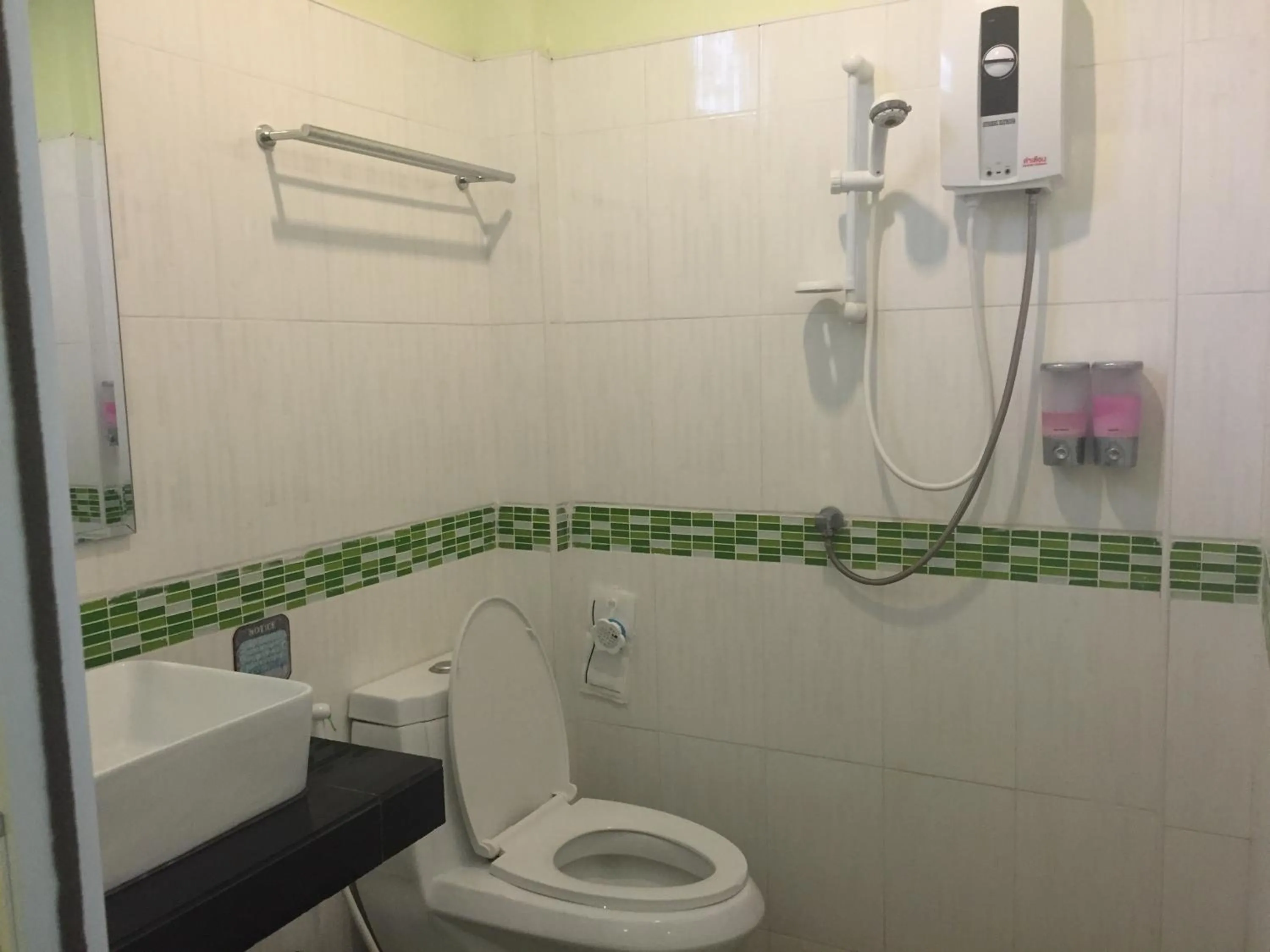 Toilet in Baan Suan Ta Hotel