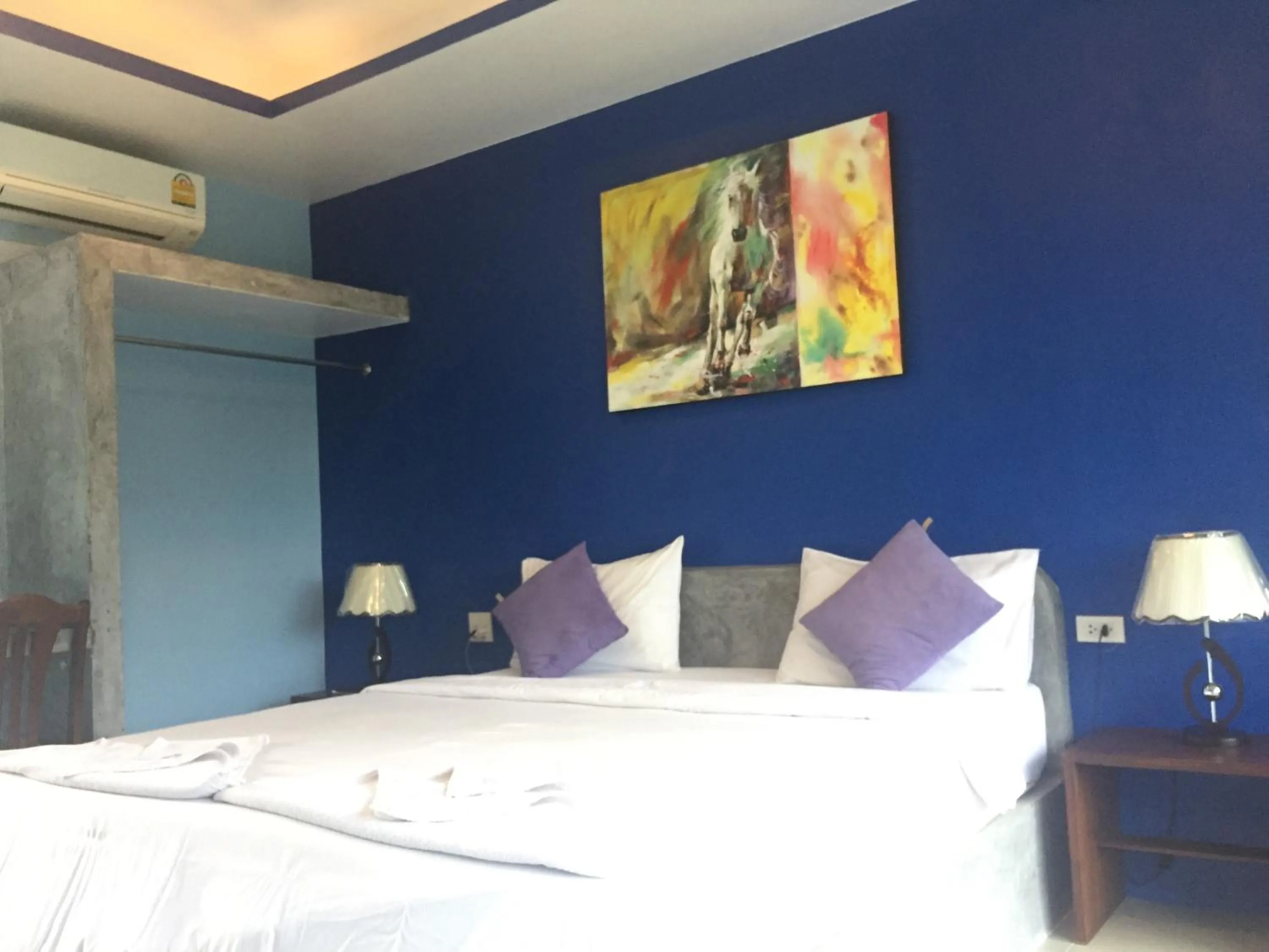 Bed in Baan Suan Ta Hotel