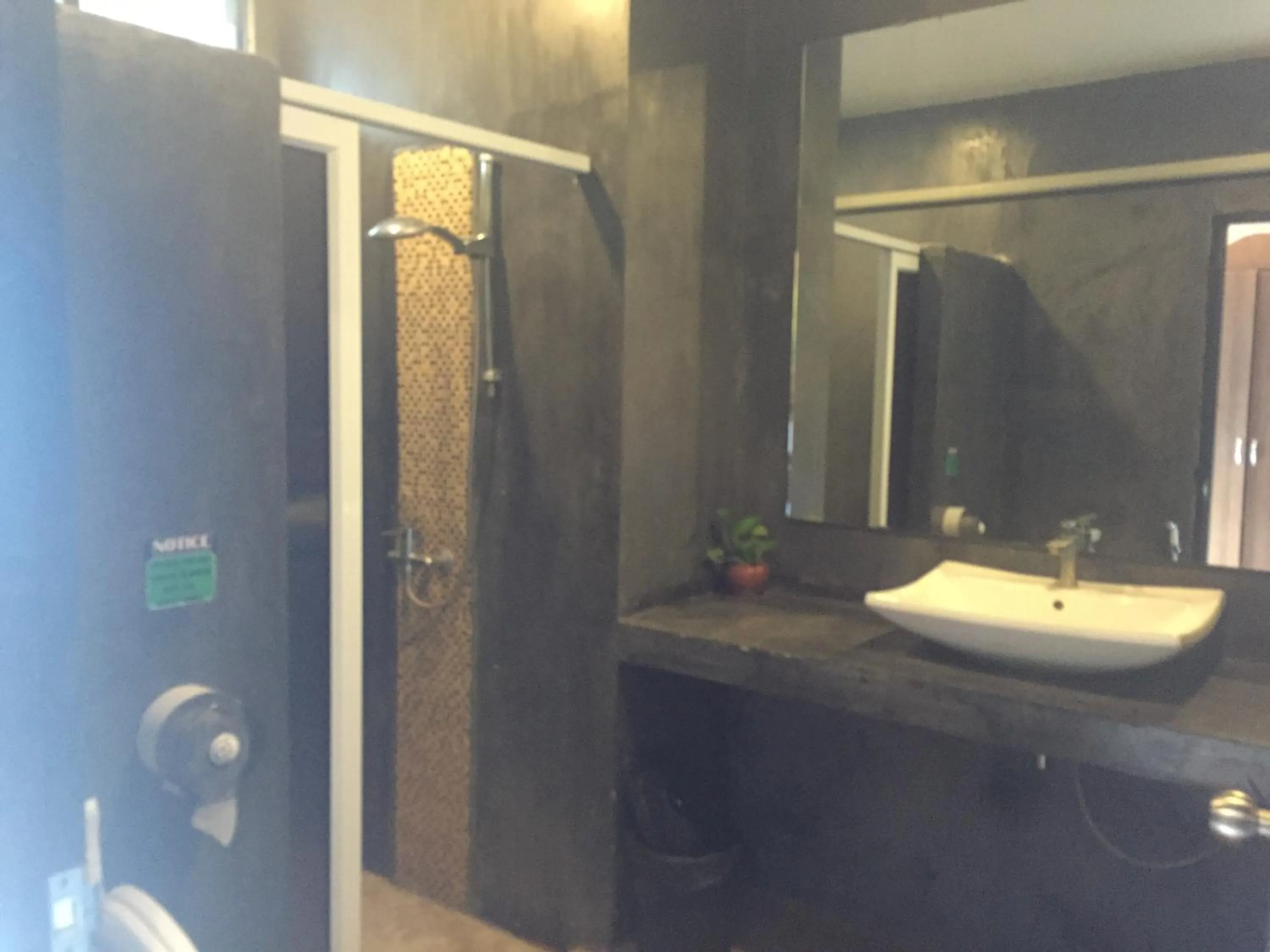 Toilet in Baan Suan Ta Hotel