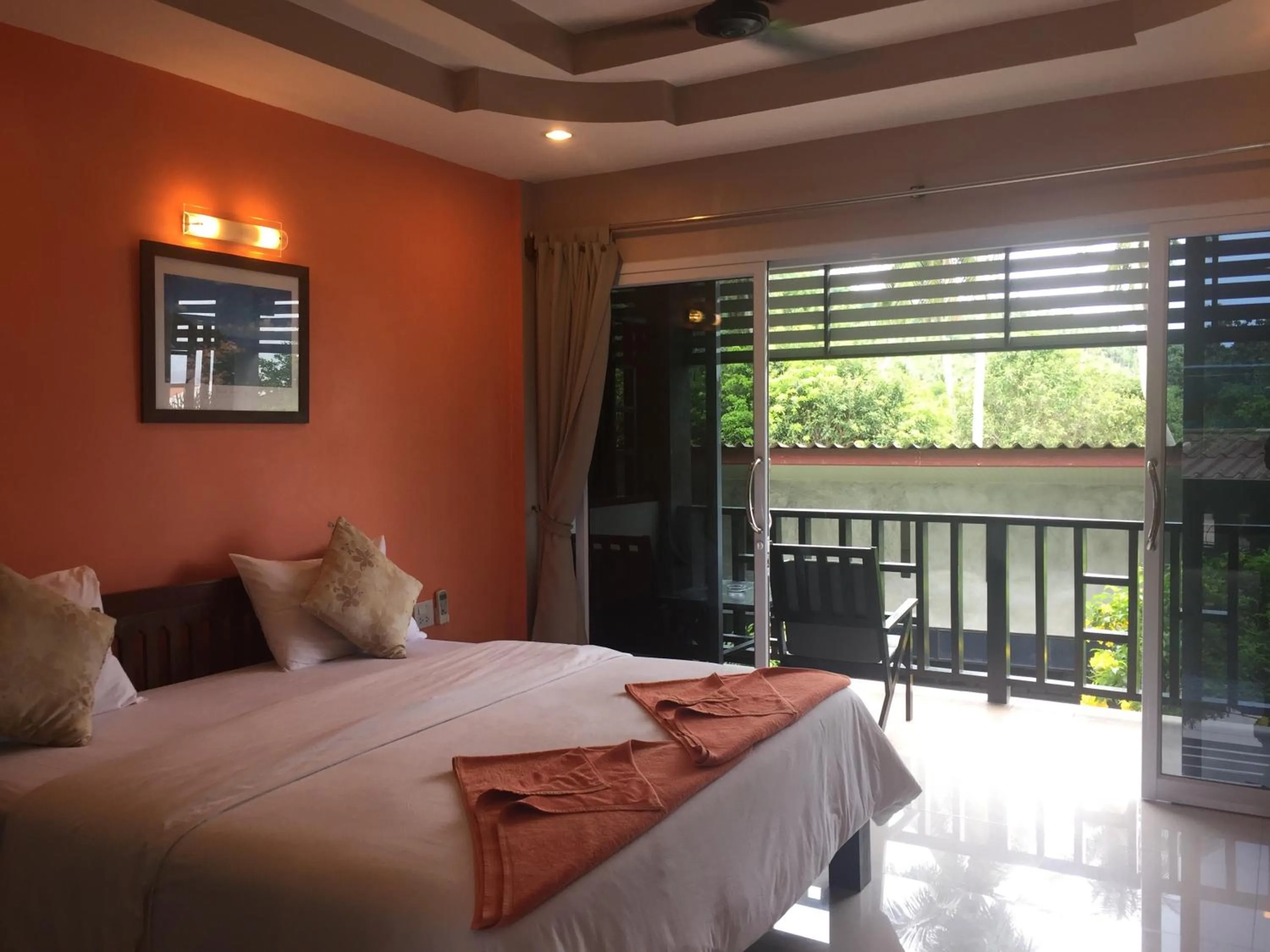 Bed in Baan Suan Ta Hotel