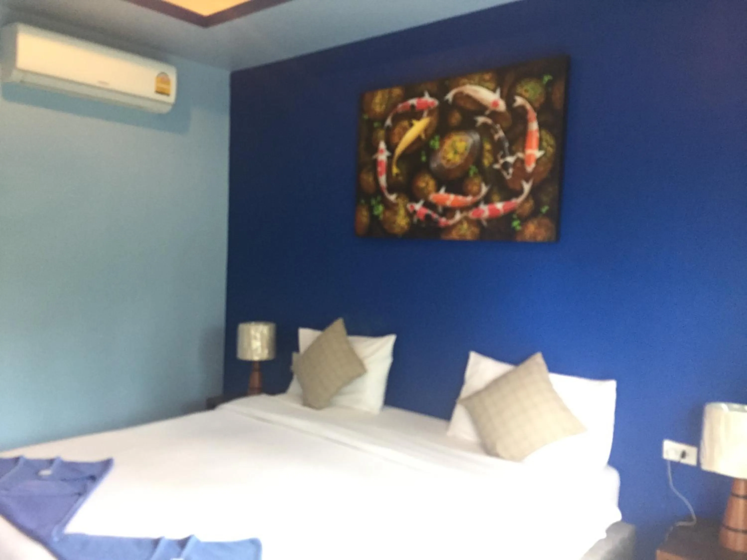 Decorative detail, Bed in Baan Suan Ta Hotel