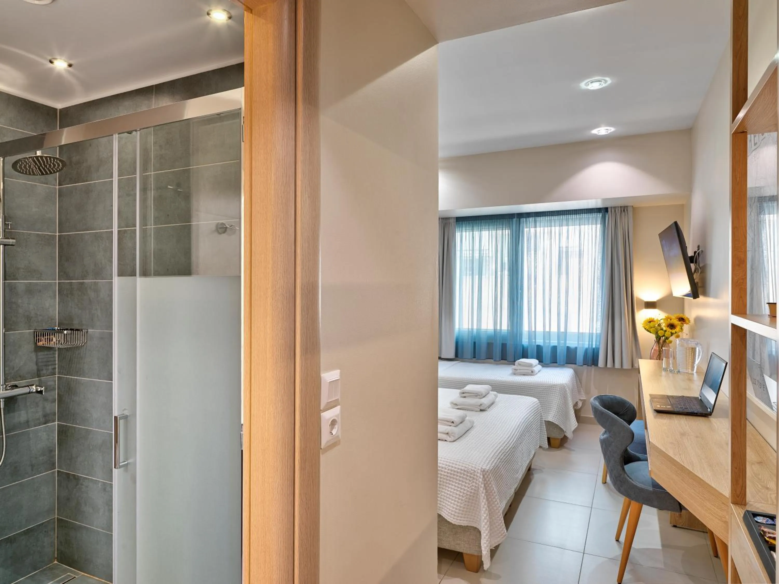 Bed in Phidias Piraeus Hotel