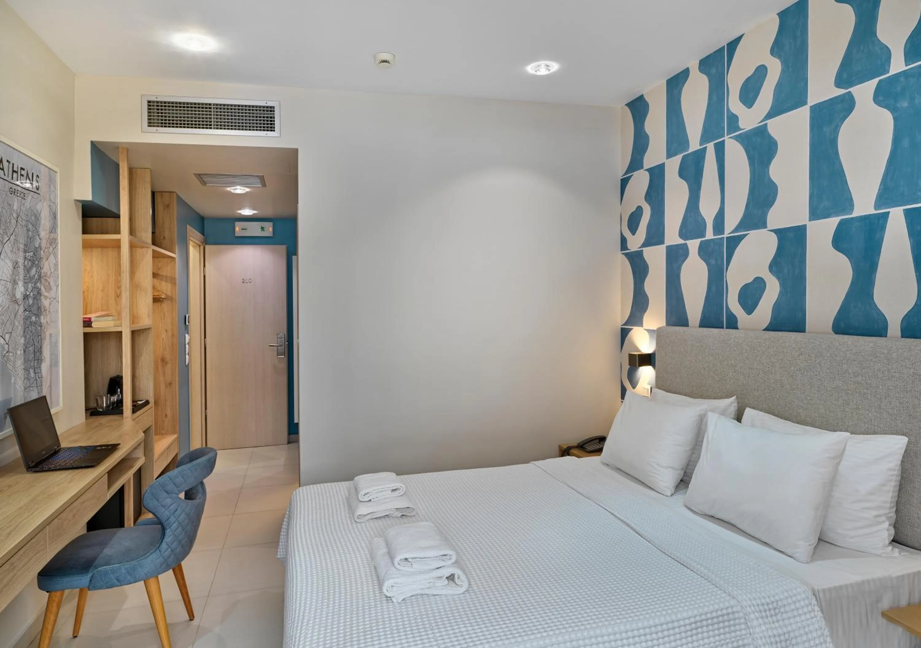 Bed in Phidias Piraeus Hotel