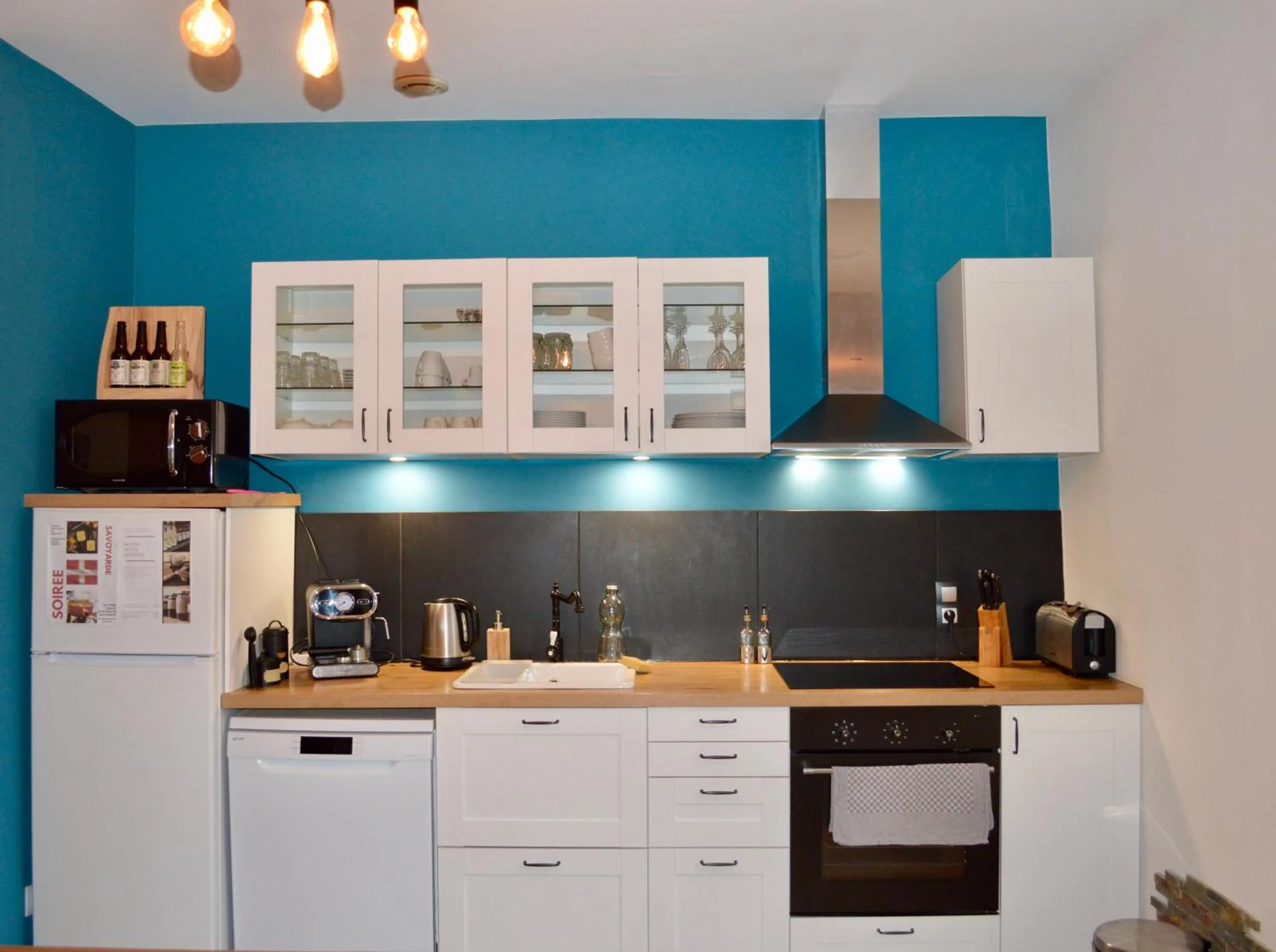 Communal kitchen in Maison Maliga J&G House