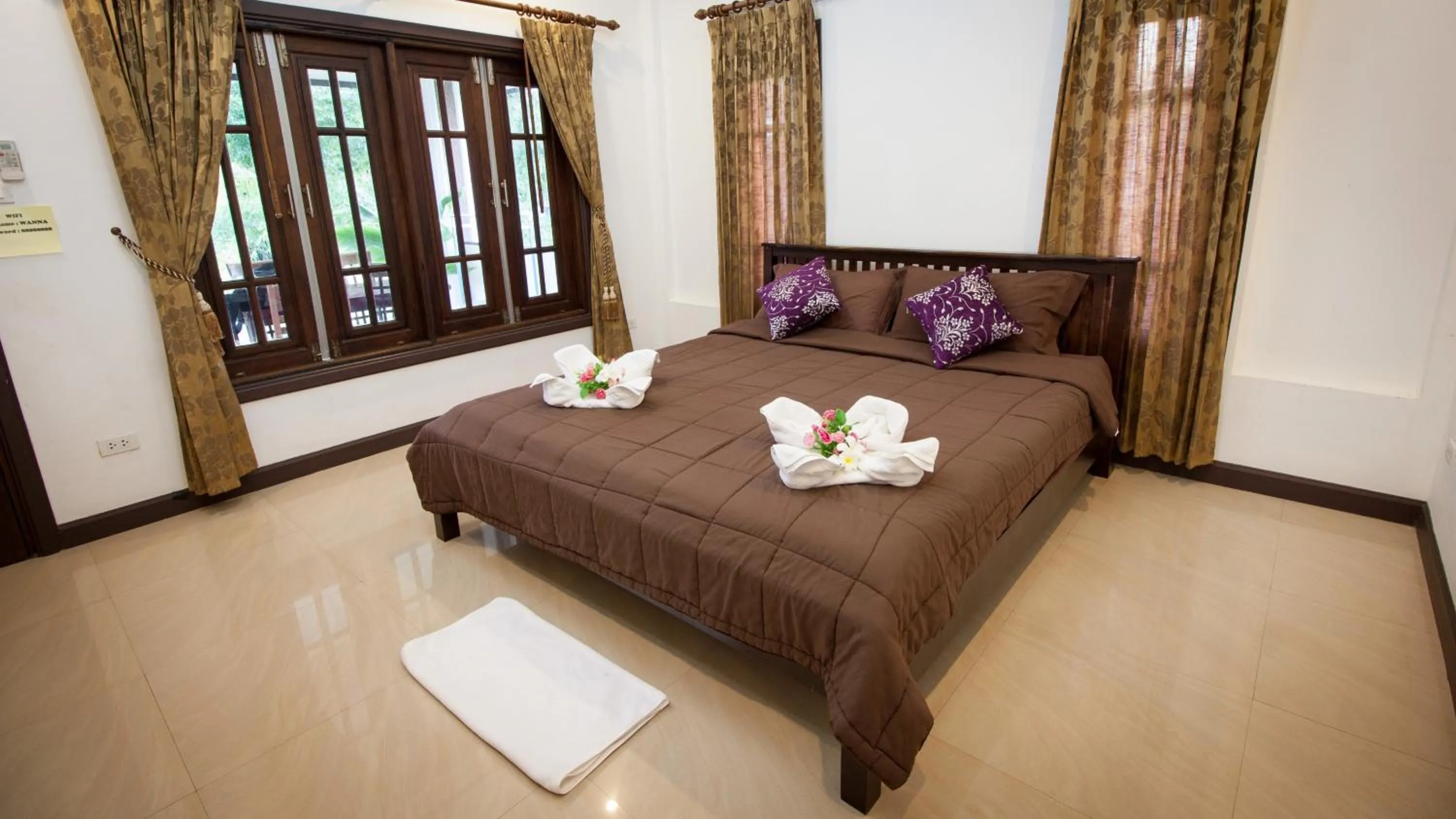 Bed in Oscar Villa Aonang Krabi