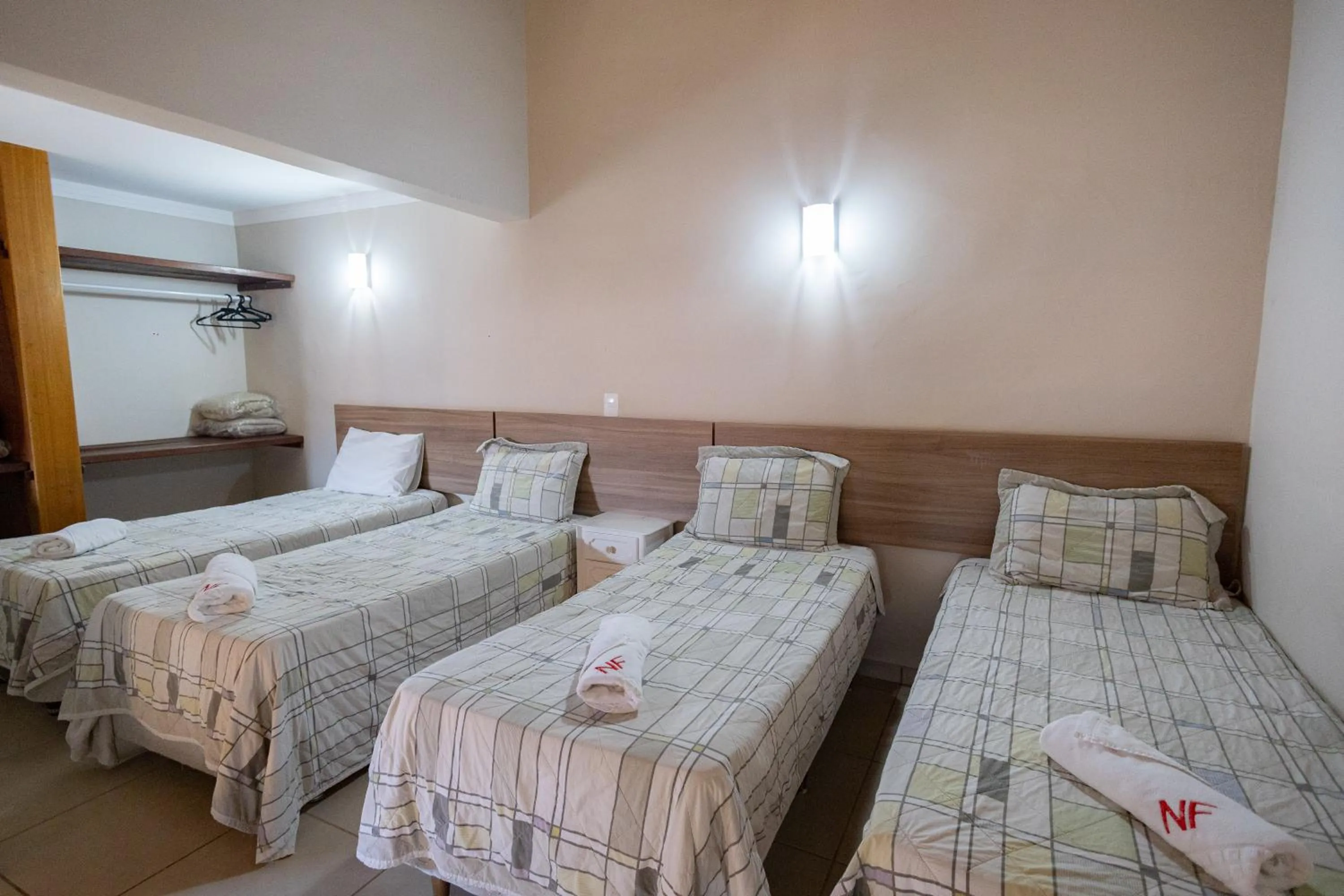 Bed in Pousada Nefelibatas