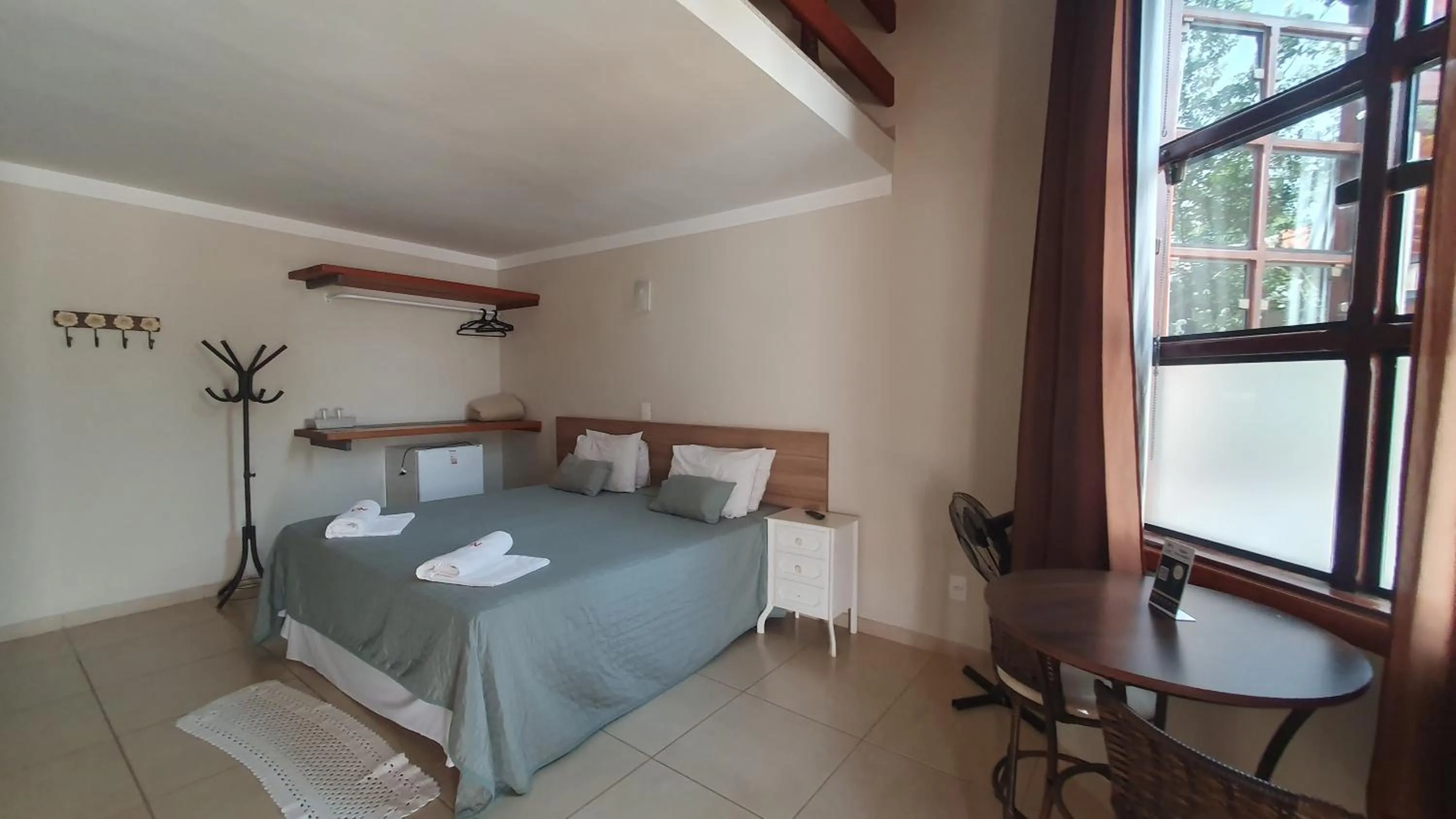 Bed in Pousada Nefelibatas