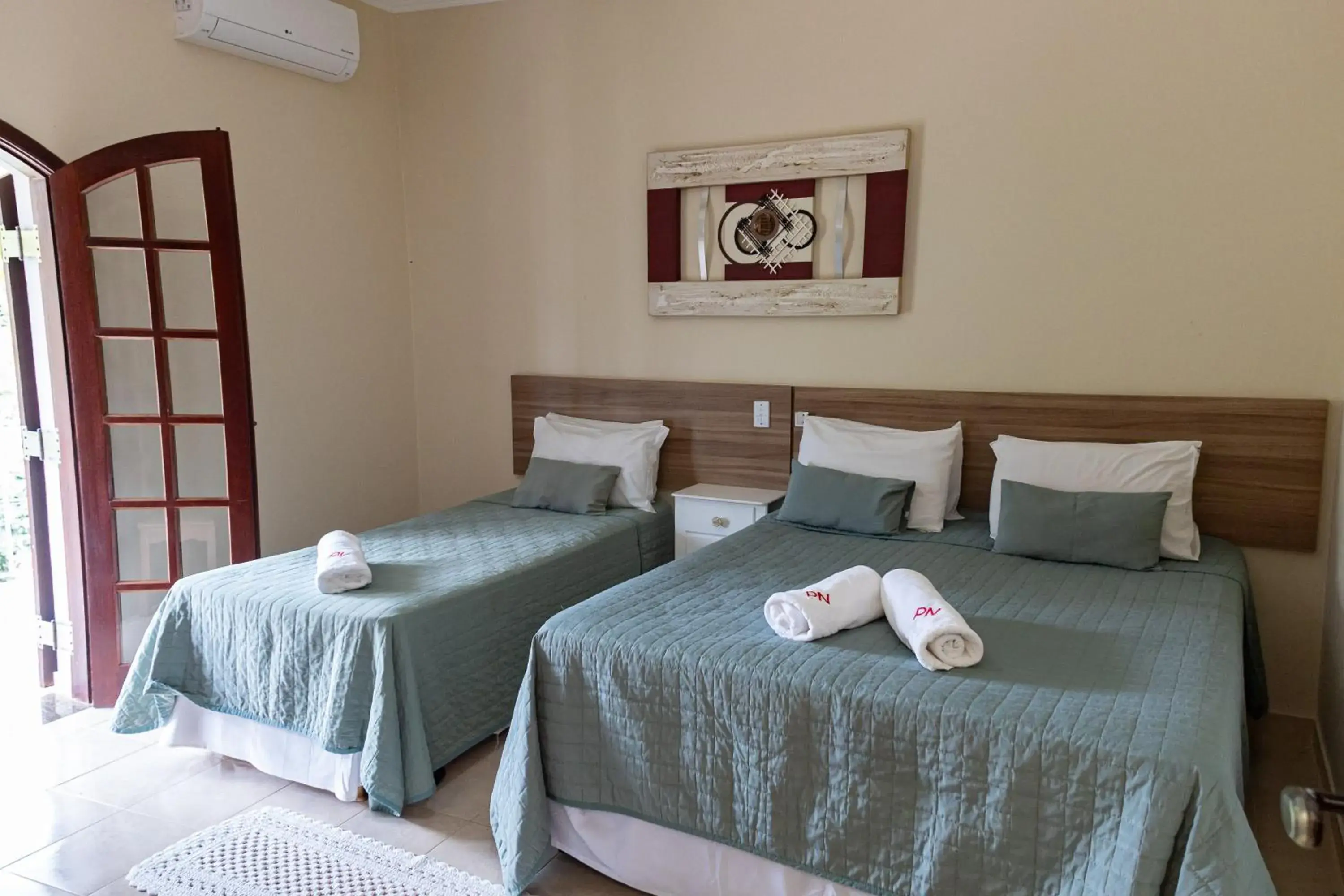 Triple Room with Balcony in Pousada Nefelibatas Triple Room with Balcony in Pousada Nefelibatas