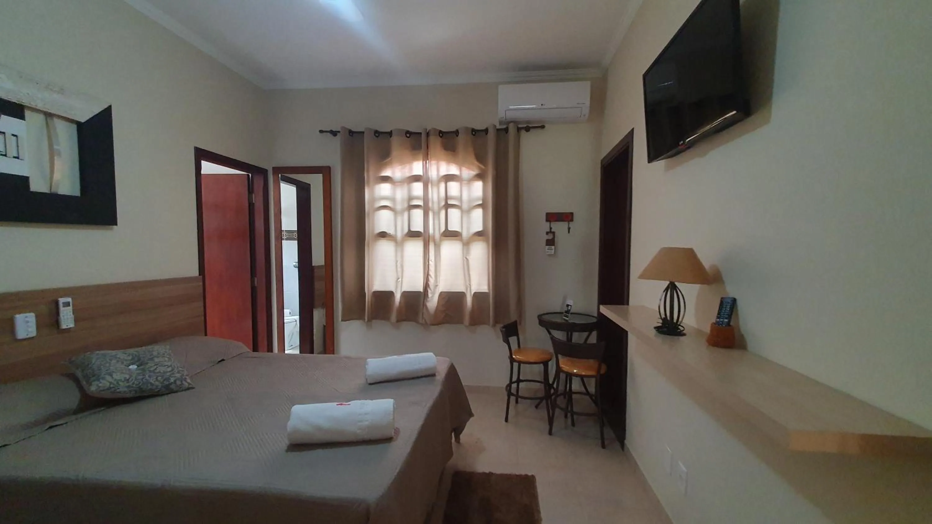 Bed in Pousada Nefelibatas