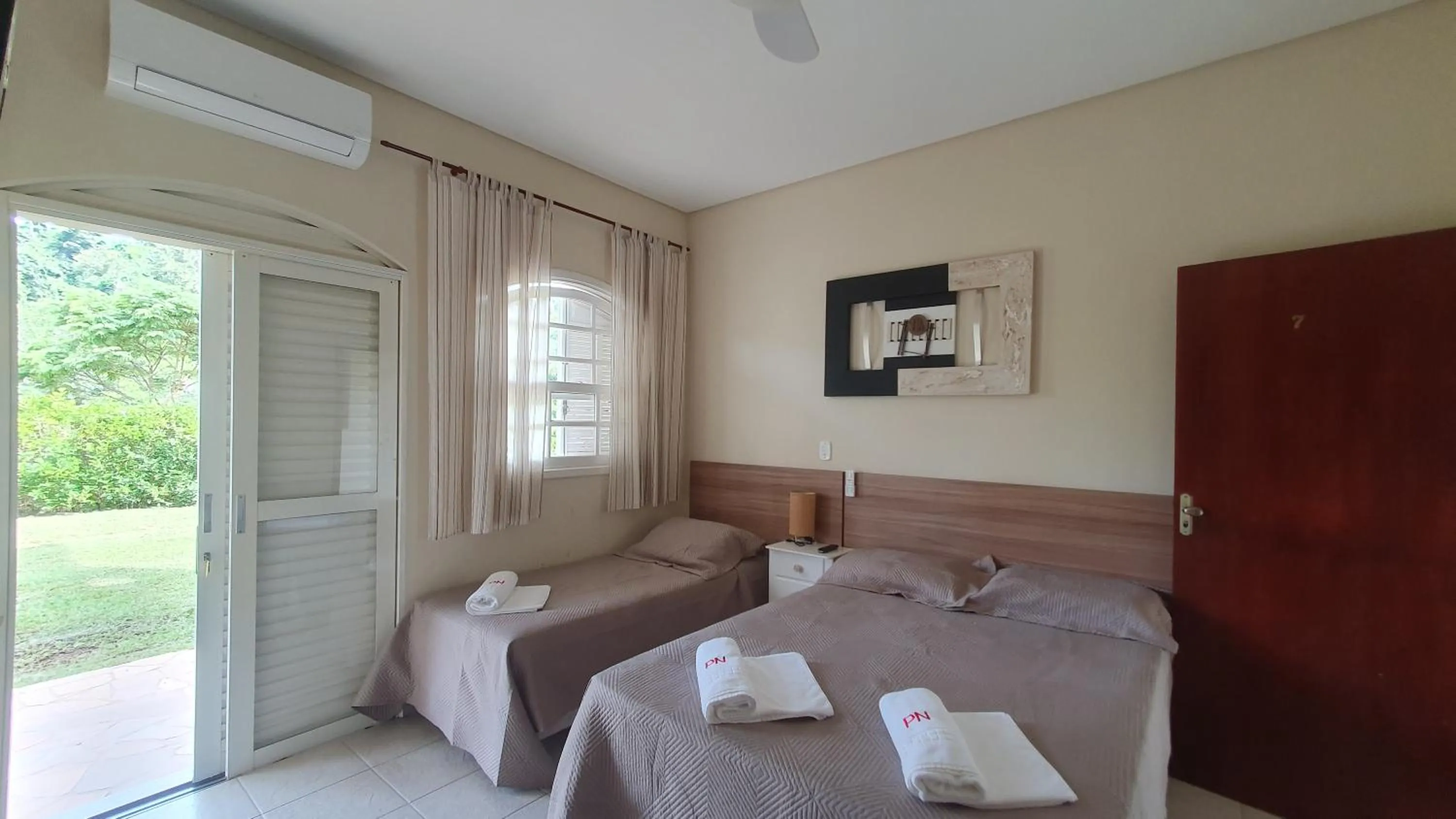 Bed in Pousada Nefelibatas