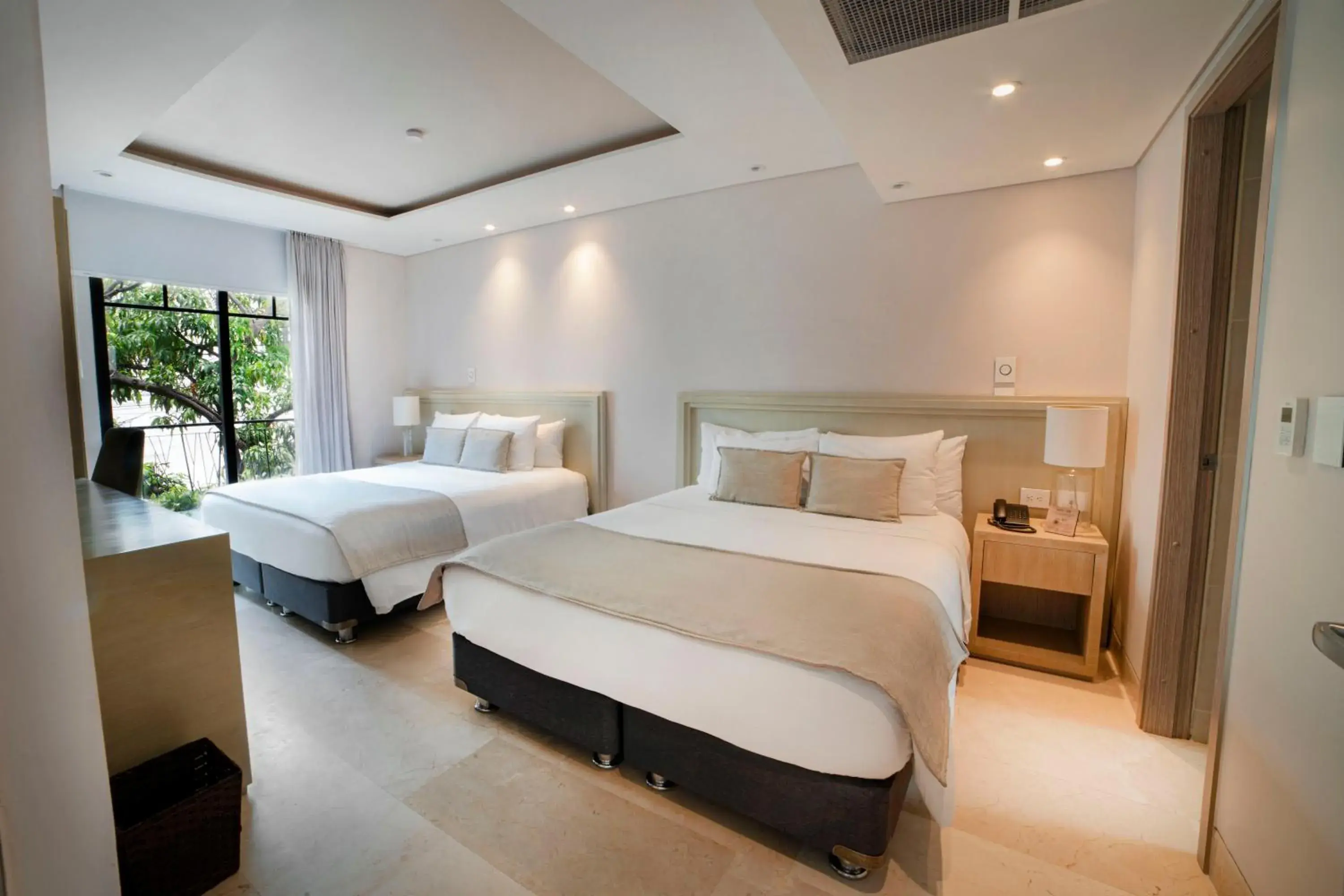 Queen Room with Two Queen Beds in Alko Hotel Cotona Queen Room with Two Queen Beds in Alko Hotel Cotona