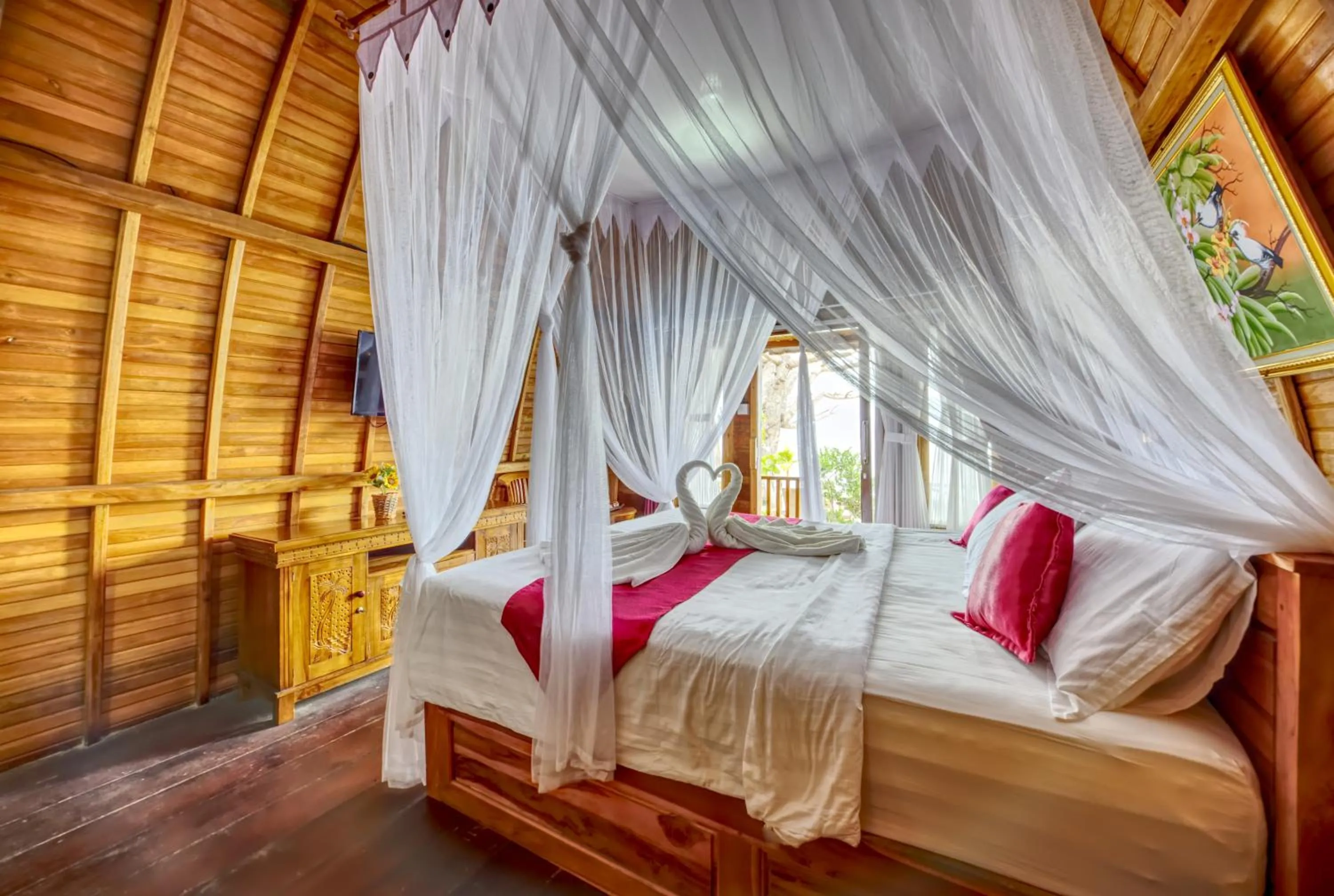Bed in Santen Beach Bungalows
