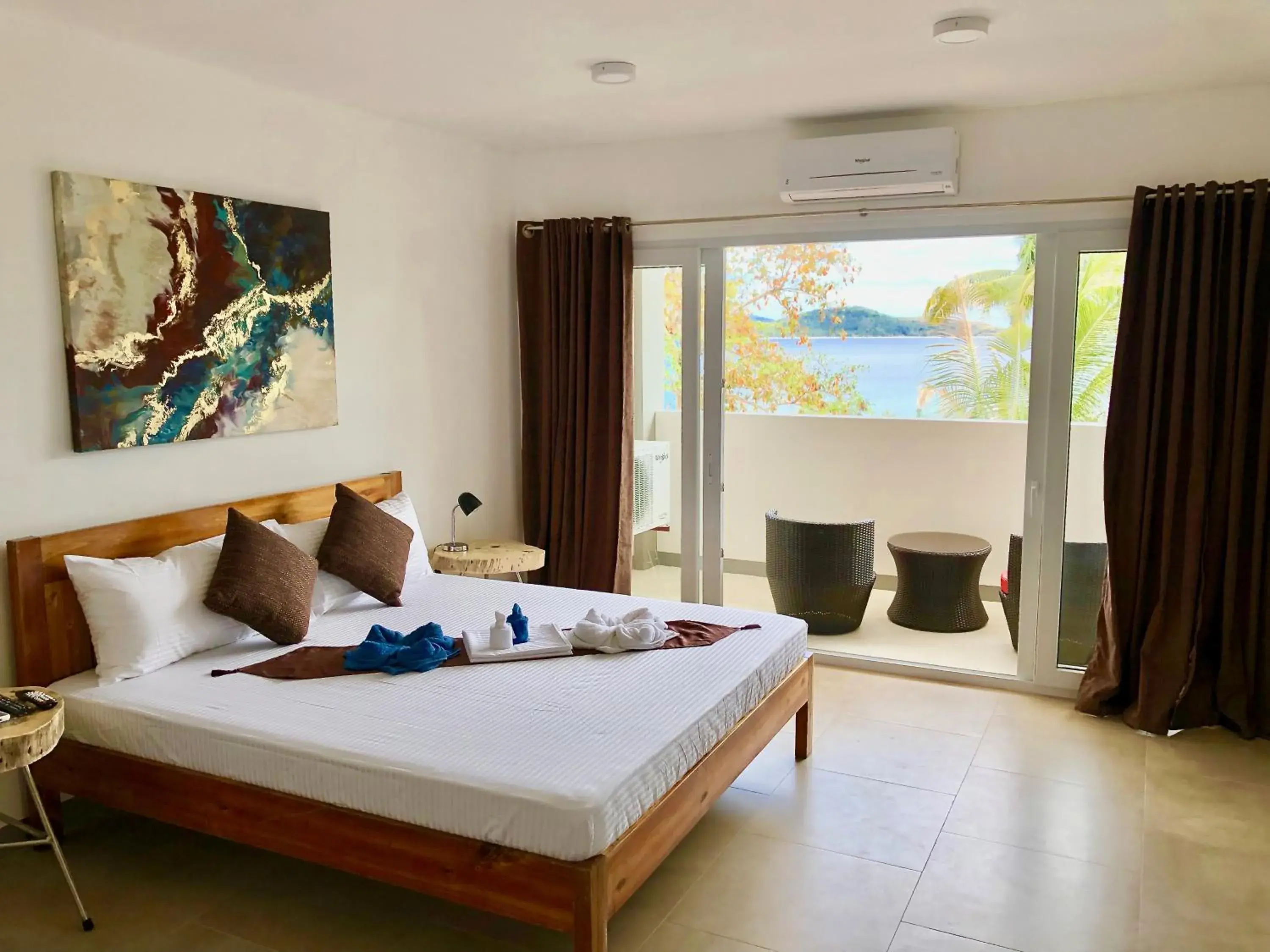 Deluxe Double Room with Balcony and Sea View in Sunset Cove Beach & Dive Resort Deluxe Double Room with Balcony and Sea View in Sunset Cove Beach & Dive Resort