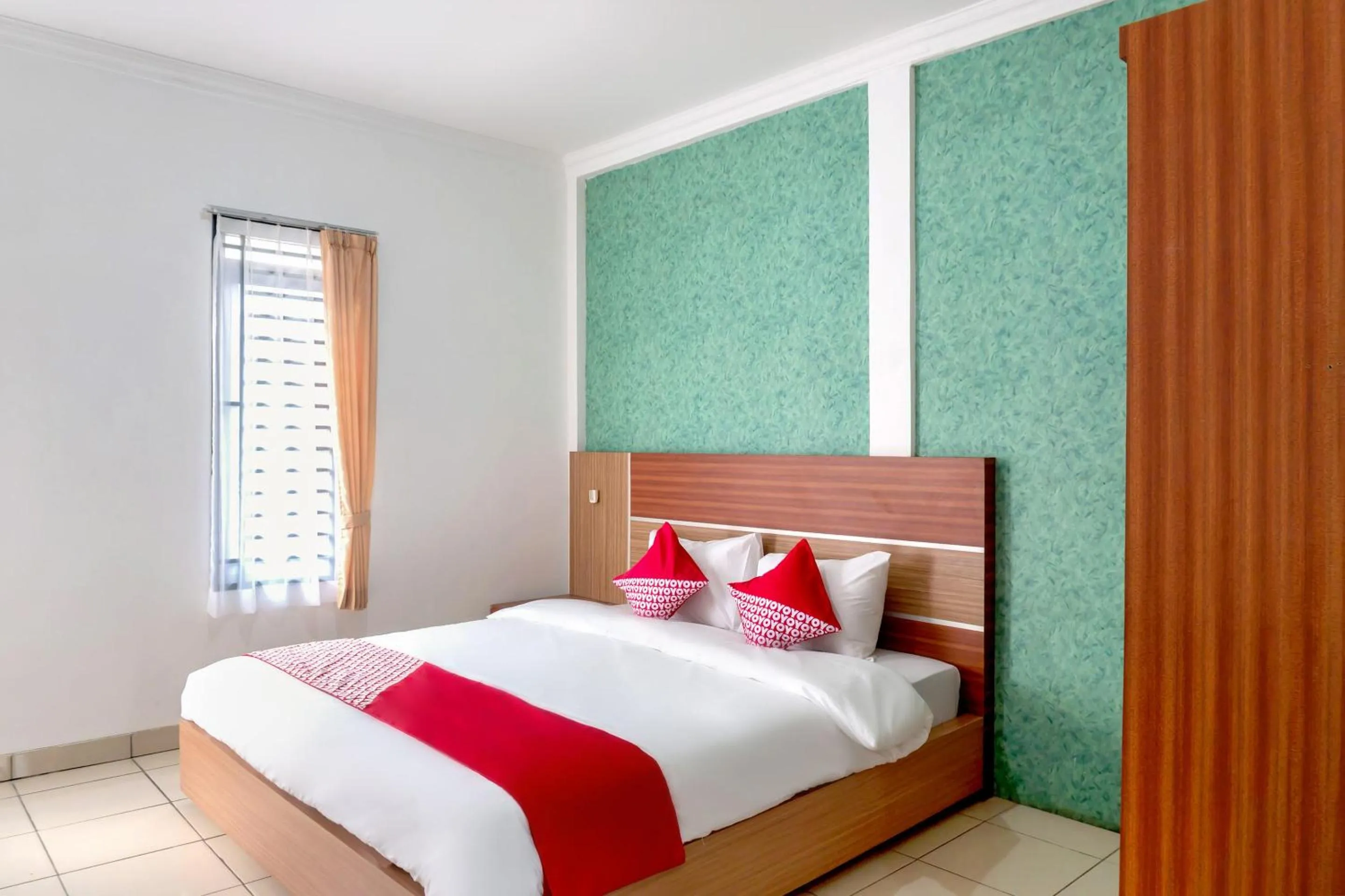 Bedroom in SUPER OYO 617 Sukaraja Residence Syariah