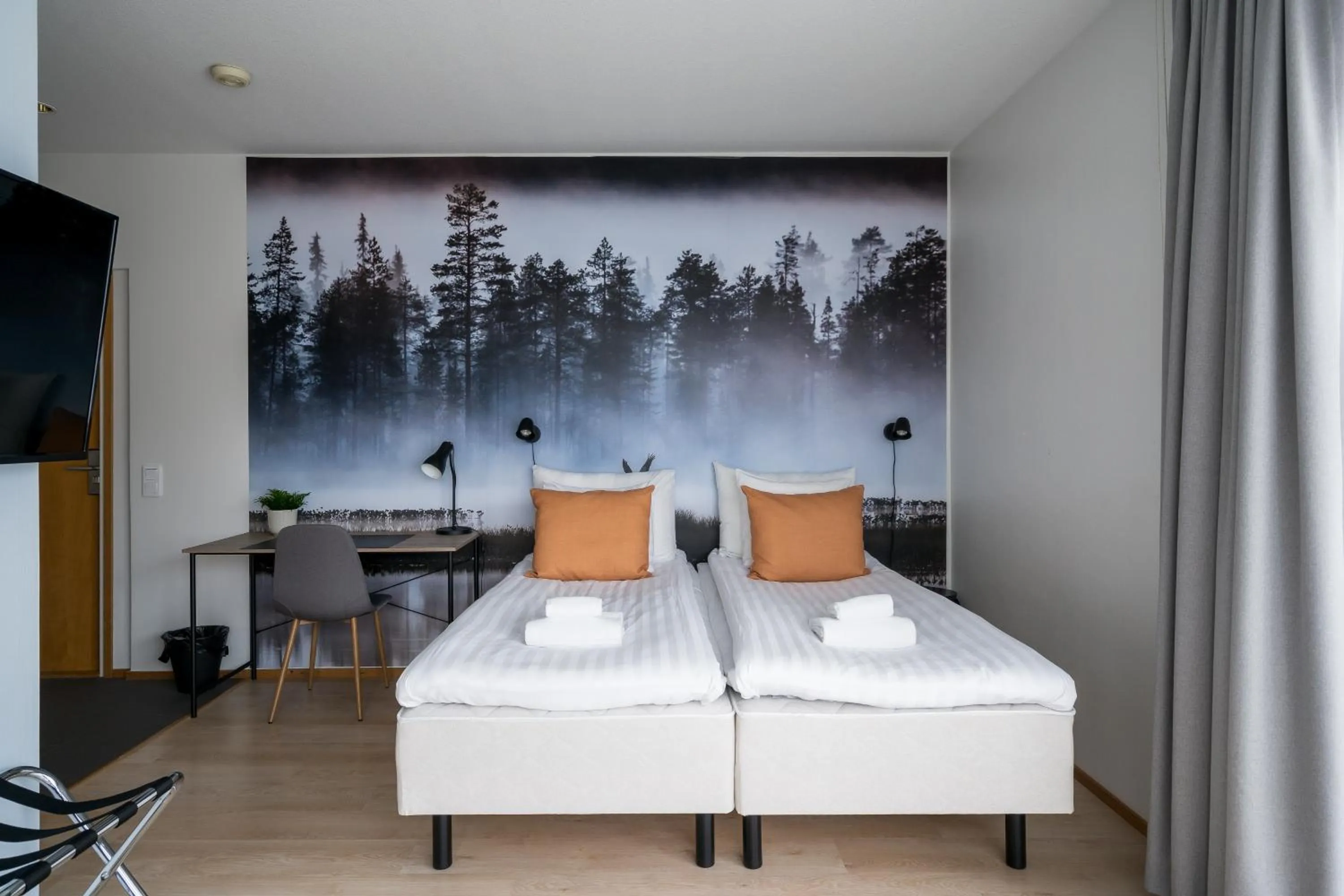 Bed in Hiisi Hotel Lohja