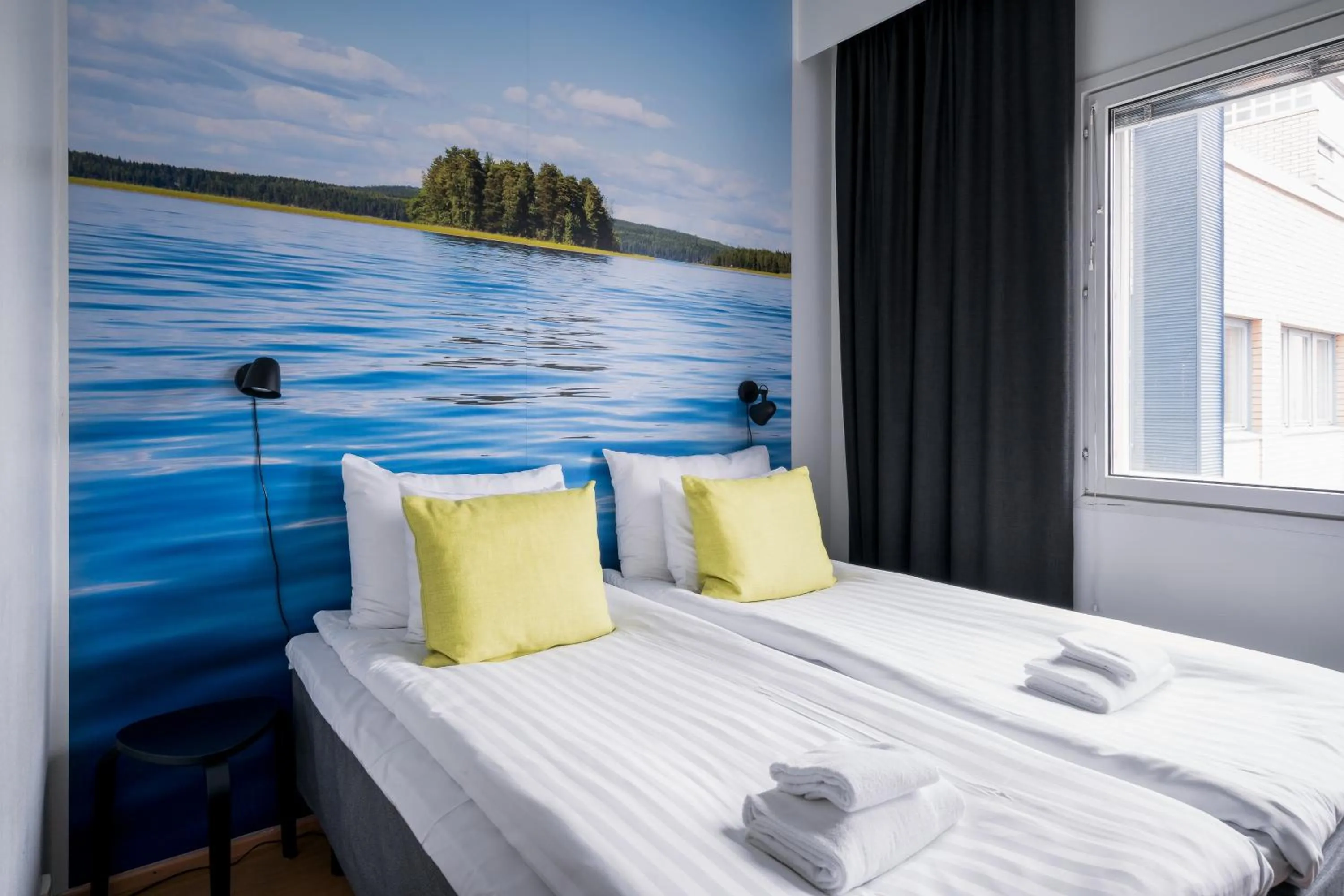 Bed in Hiisi Hotel Lohja