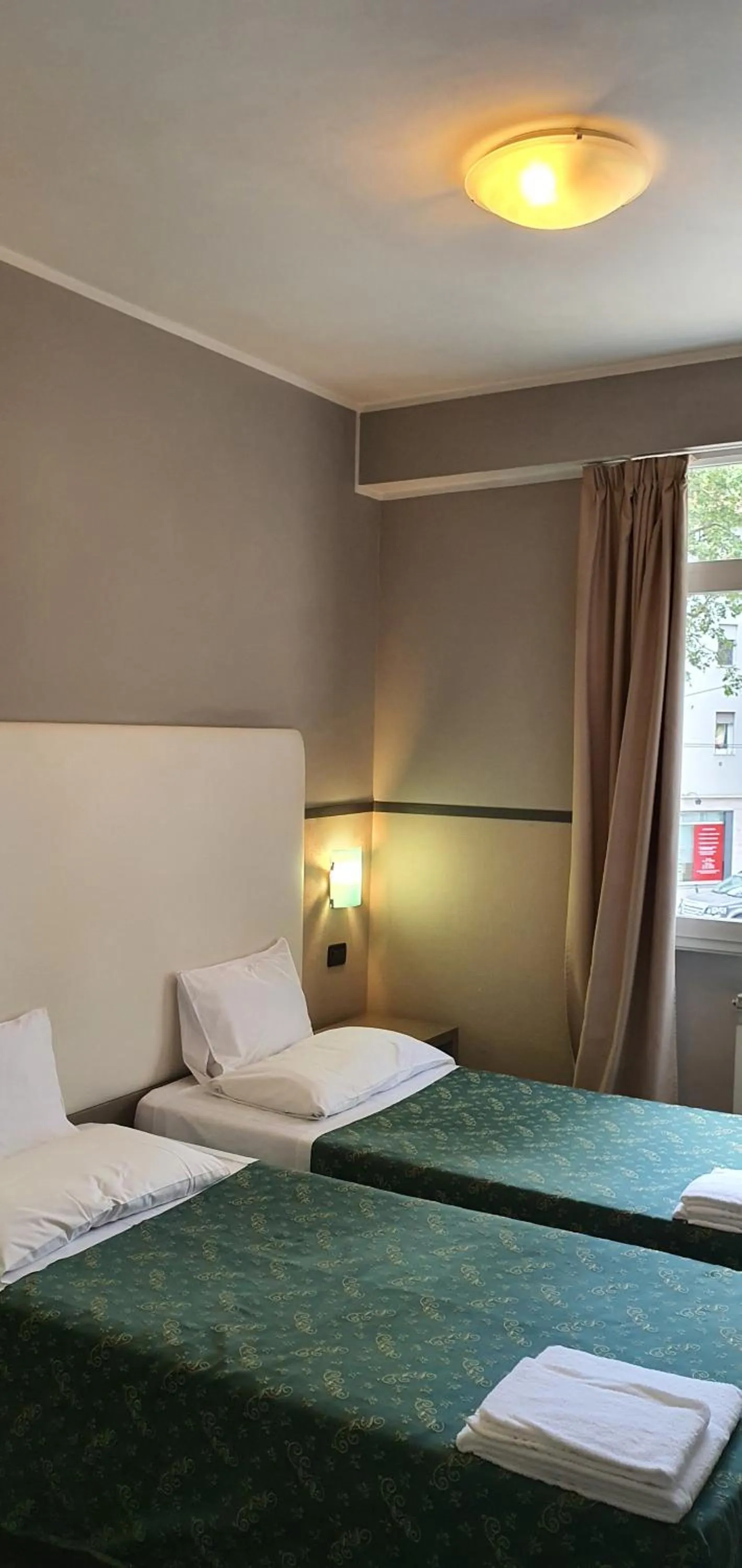 Bed in Hotel Laguna Residence