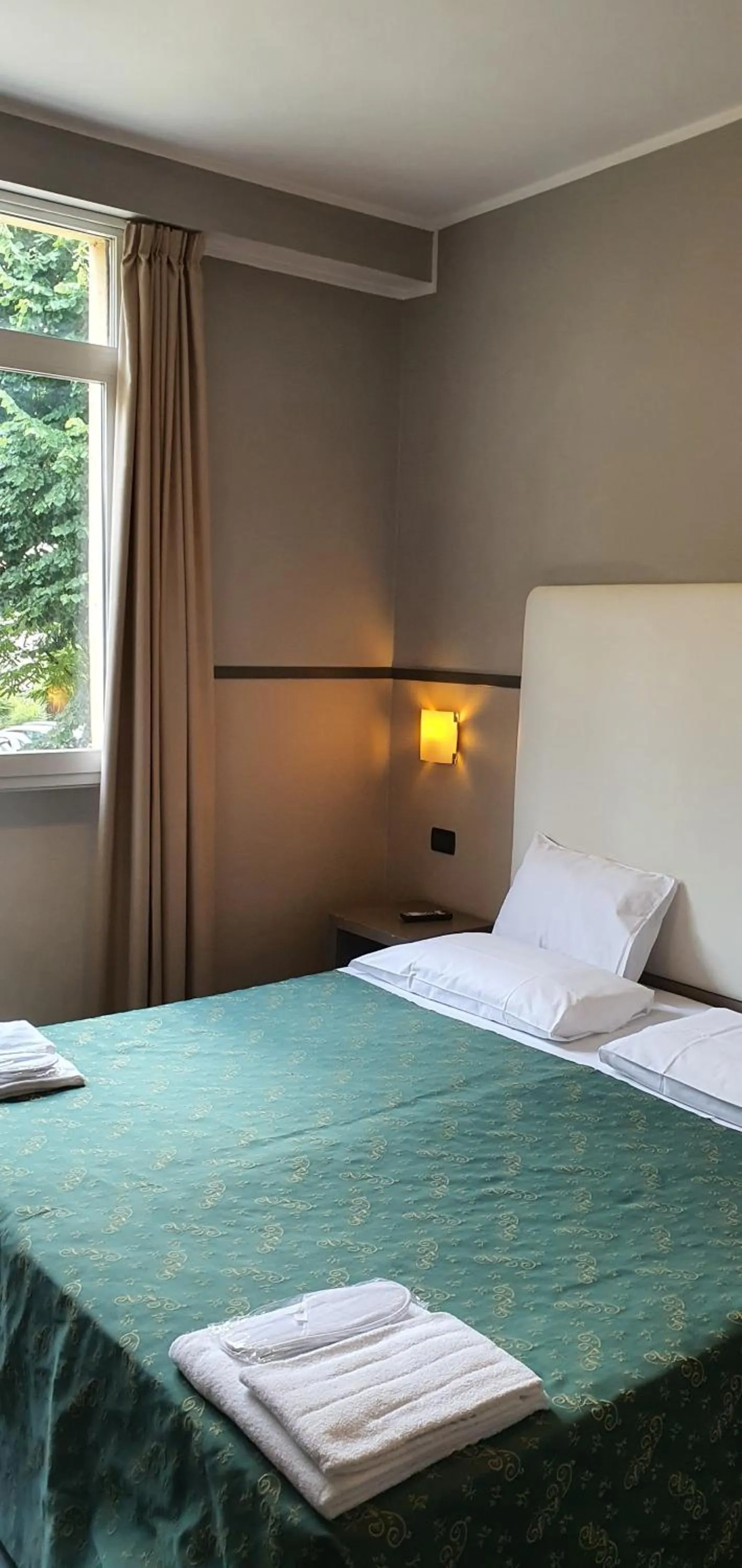 Property building, Bed in Hotel Laguna Residence