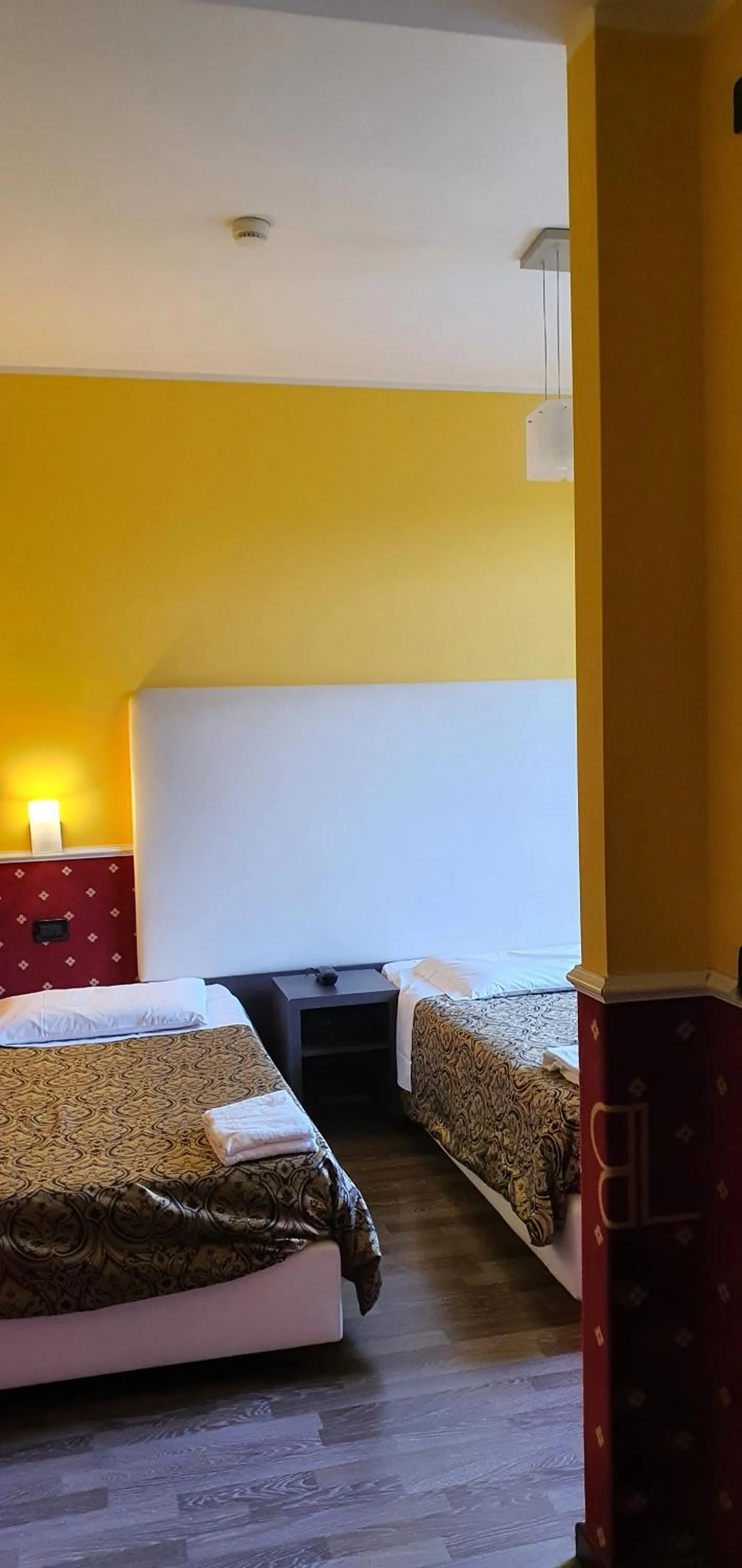 Bed in Hotel Laguna Residence