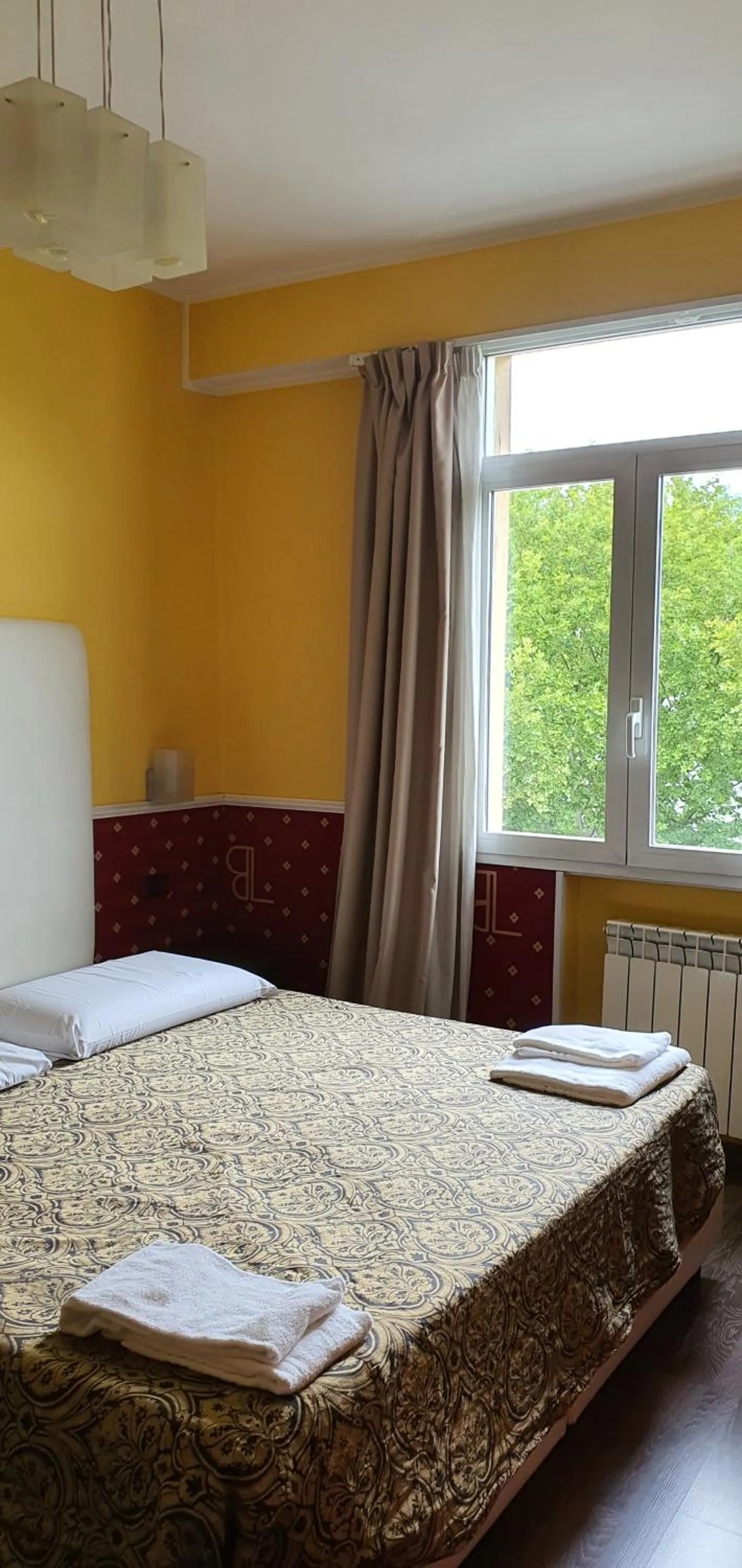 Property building, Bed in Hotel Laguna Residence