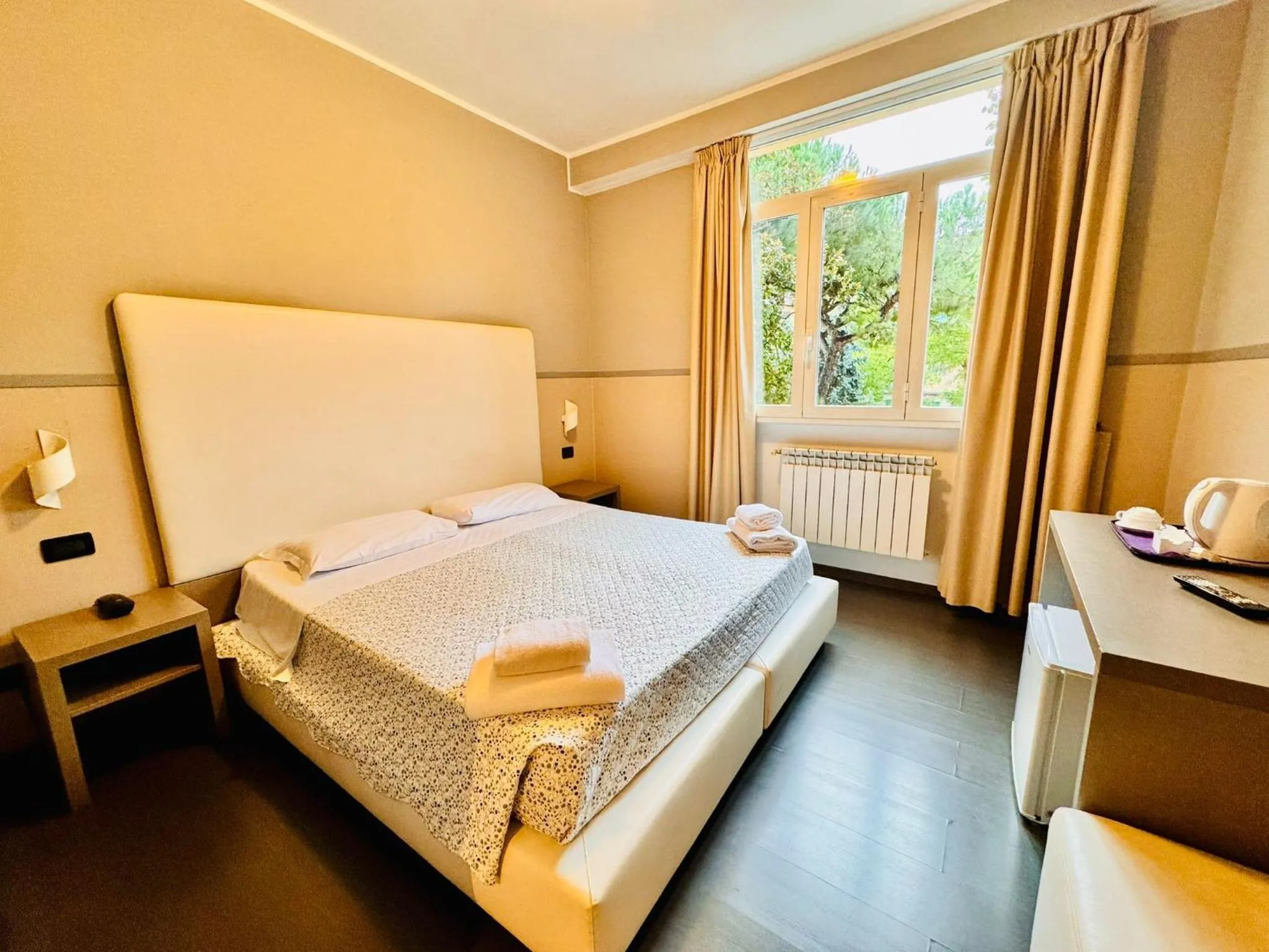 Bed in Hotel Laguna Residence