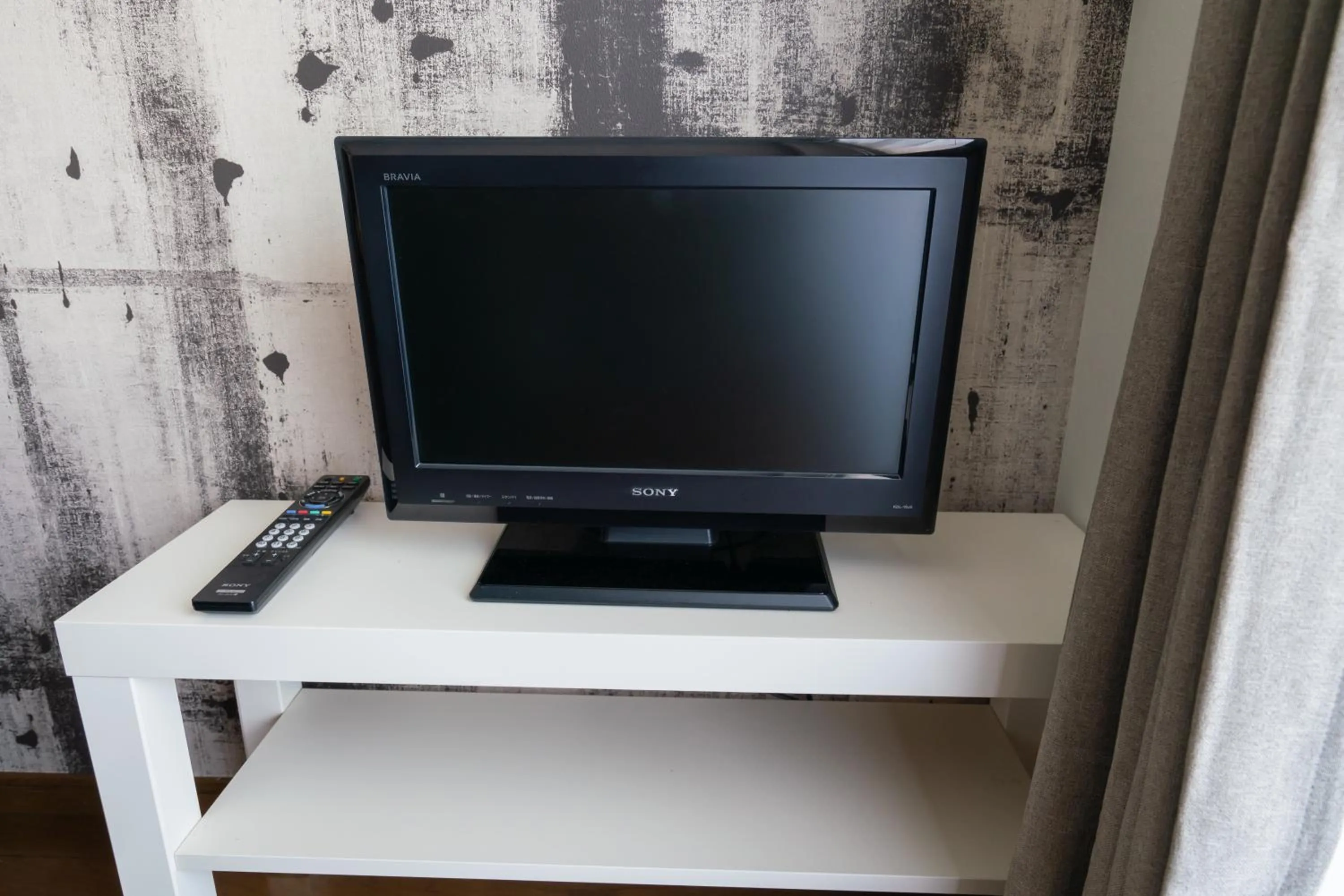 TV and multimedia in SONIC APARTMENT HOTEL