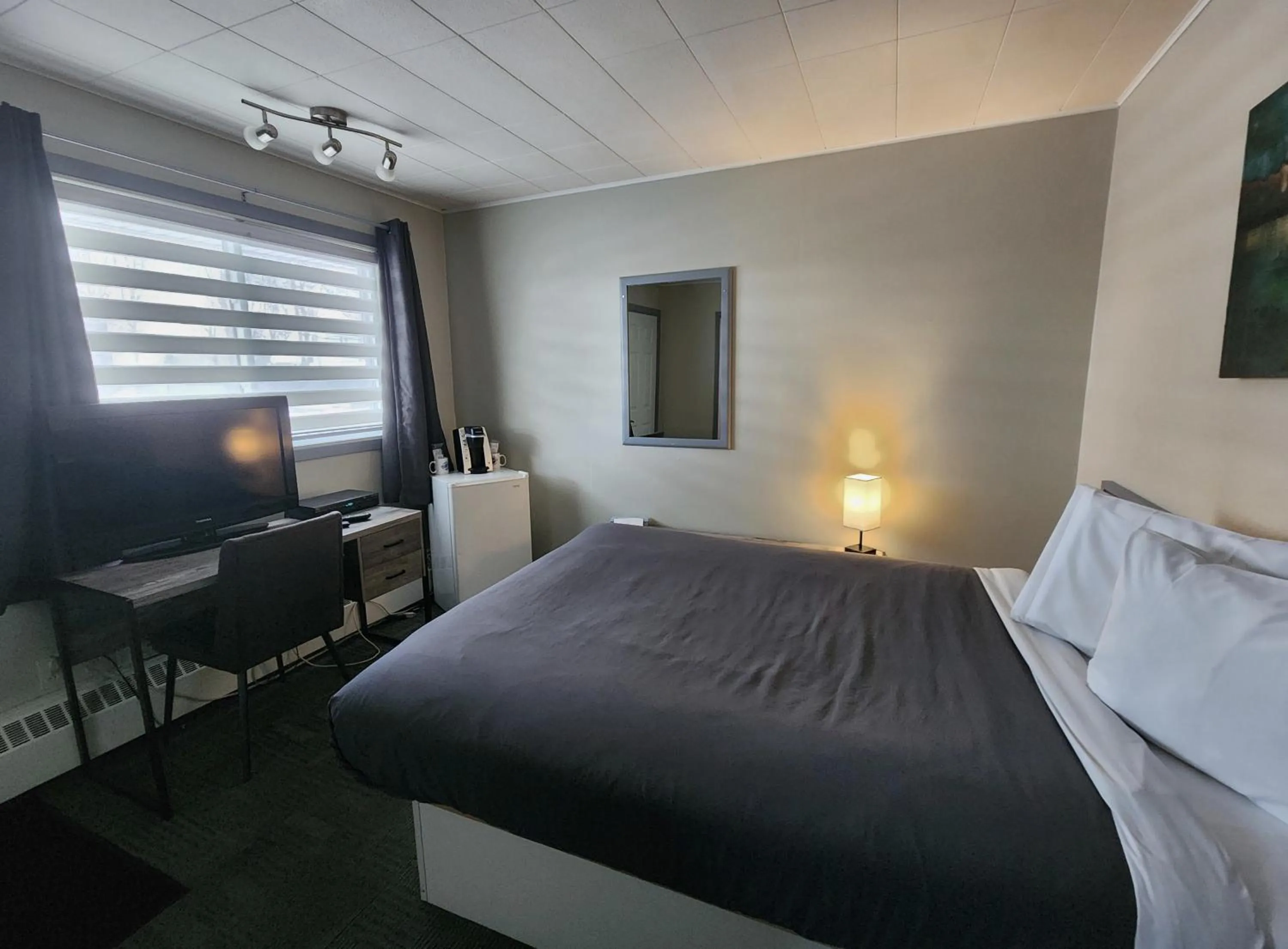 Bed in Motel Le Victo