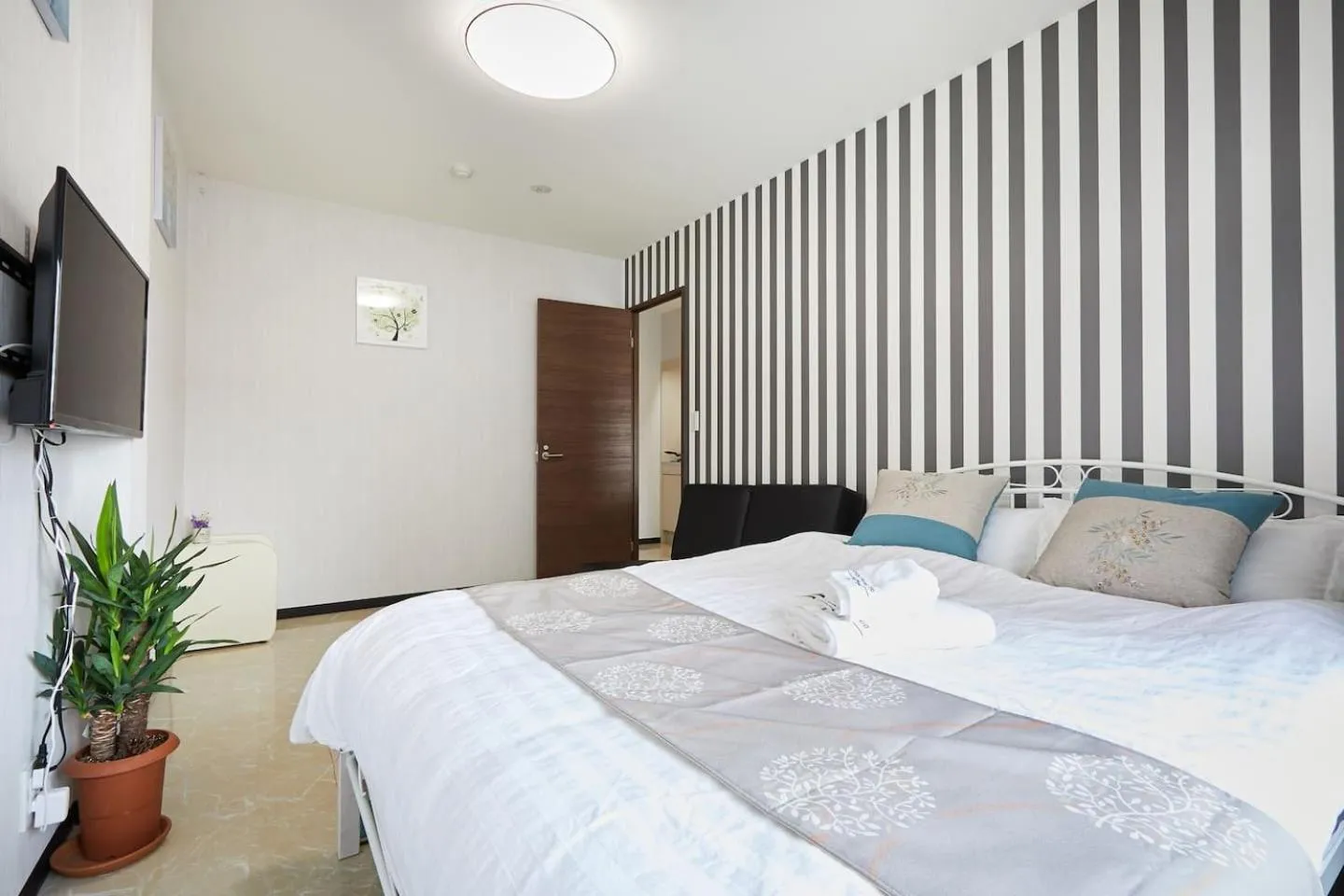 Bed in Mitsuba Guest House