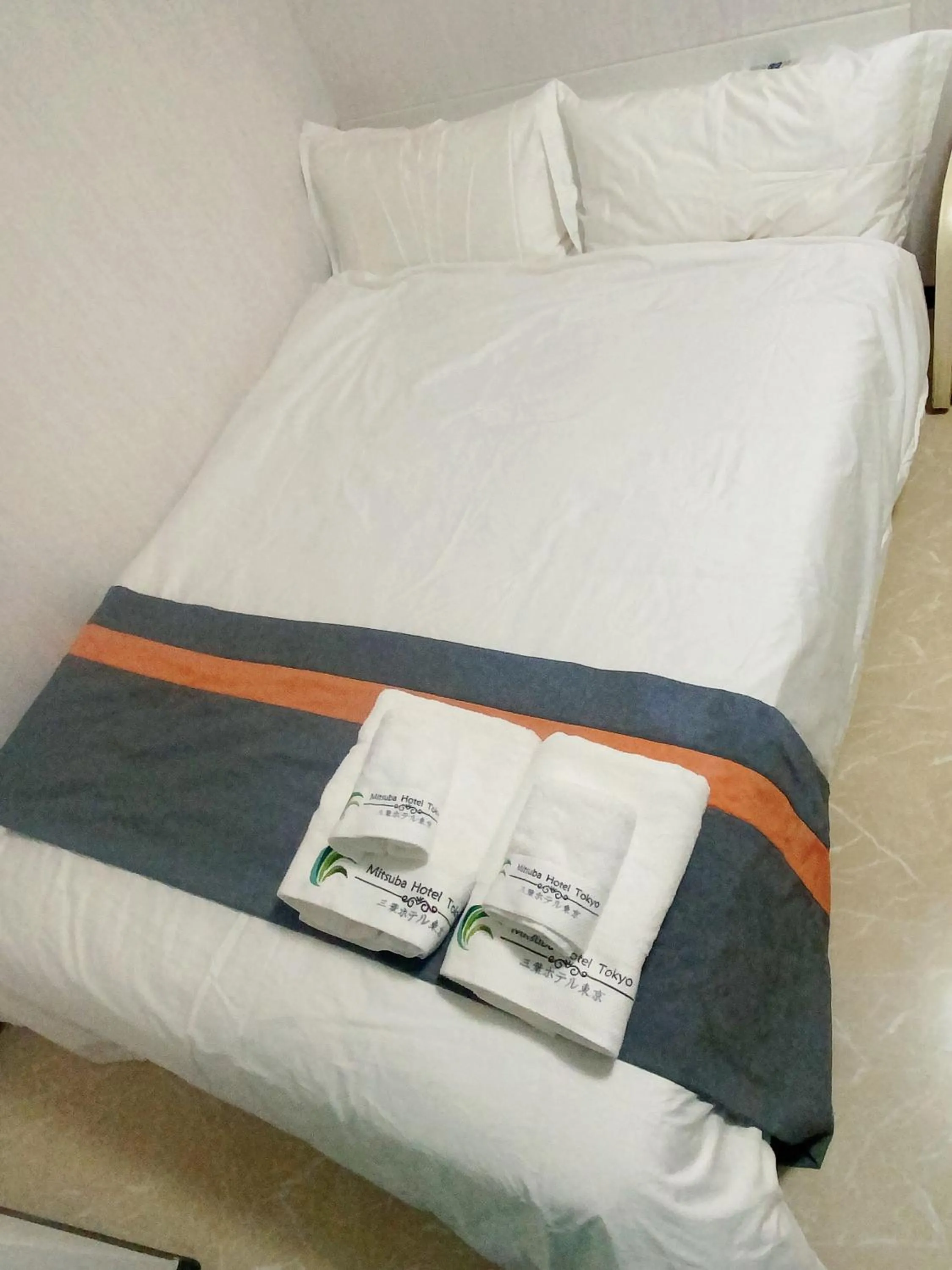 Bed in Mitsuba Guest House