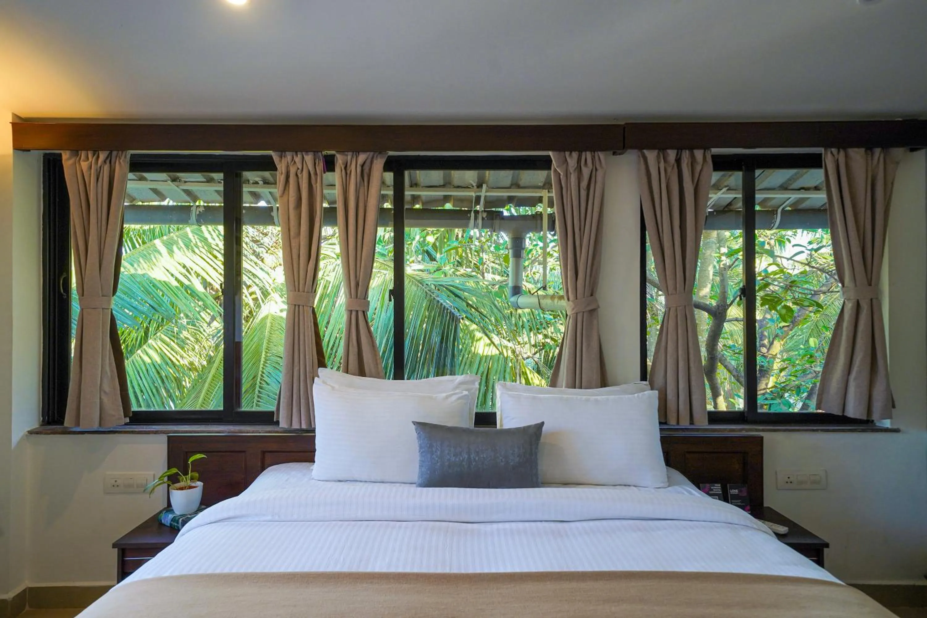 Bed in Olive Hotel Alidia Beach Resort by Embassy Group