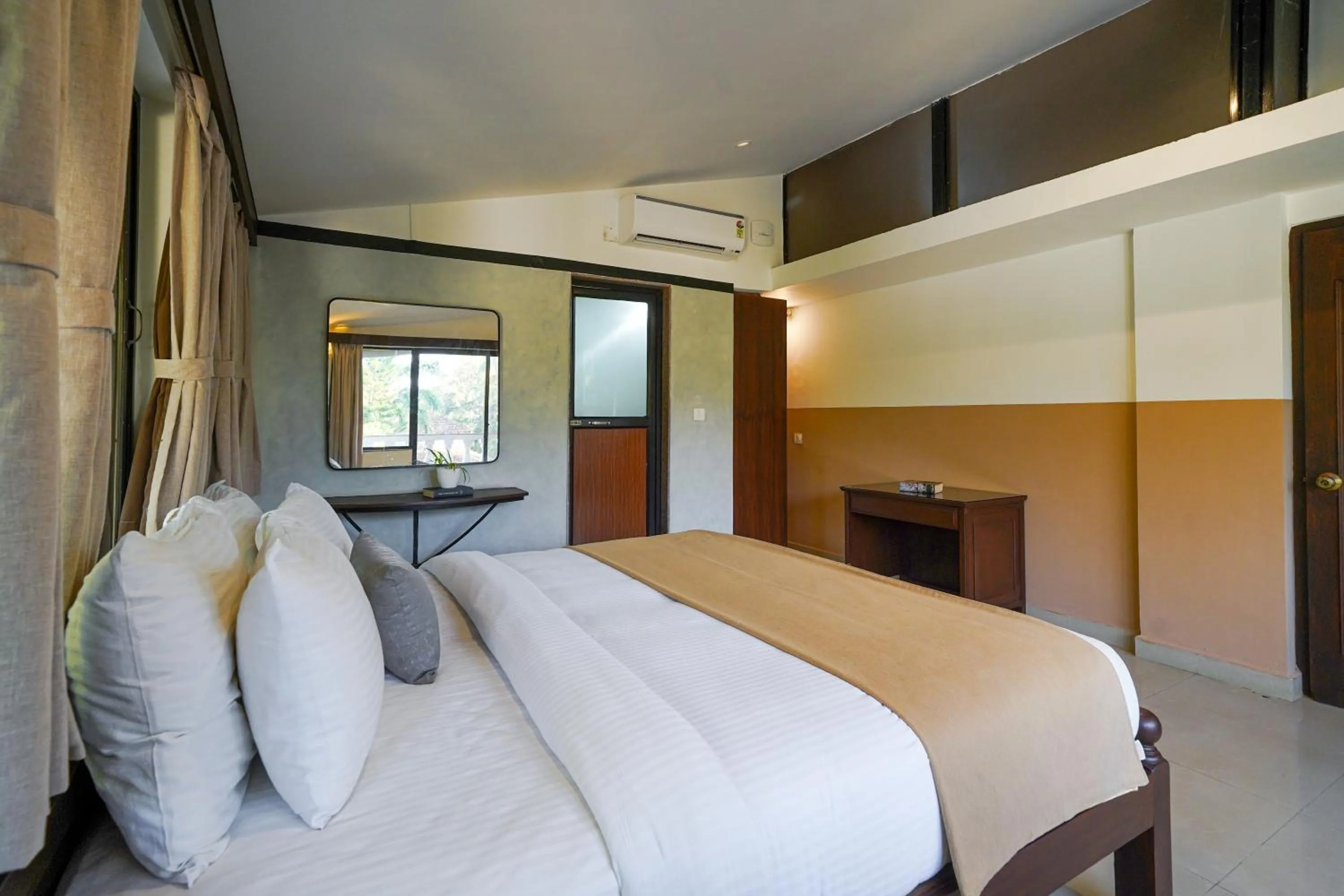 Bed in Olive Hotel Alidia Beach Resort by Embassy Group