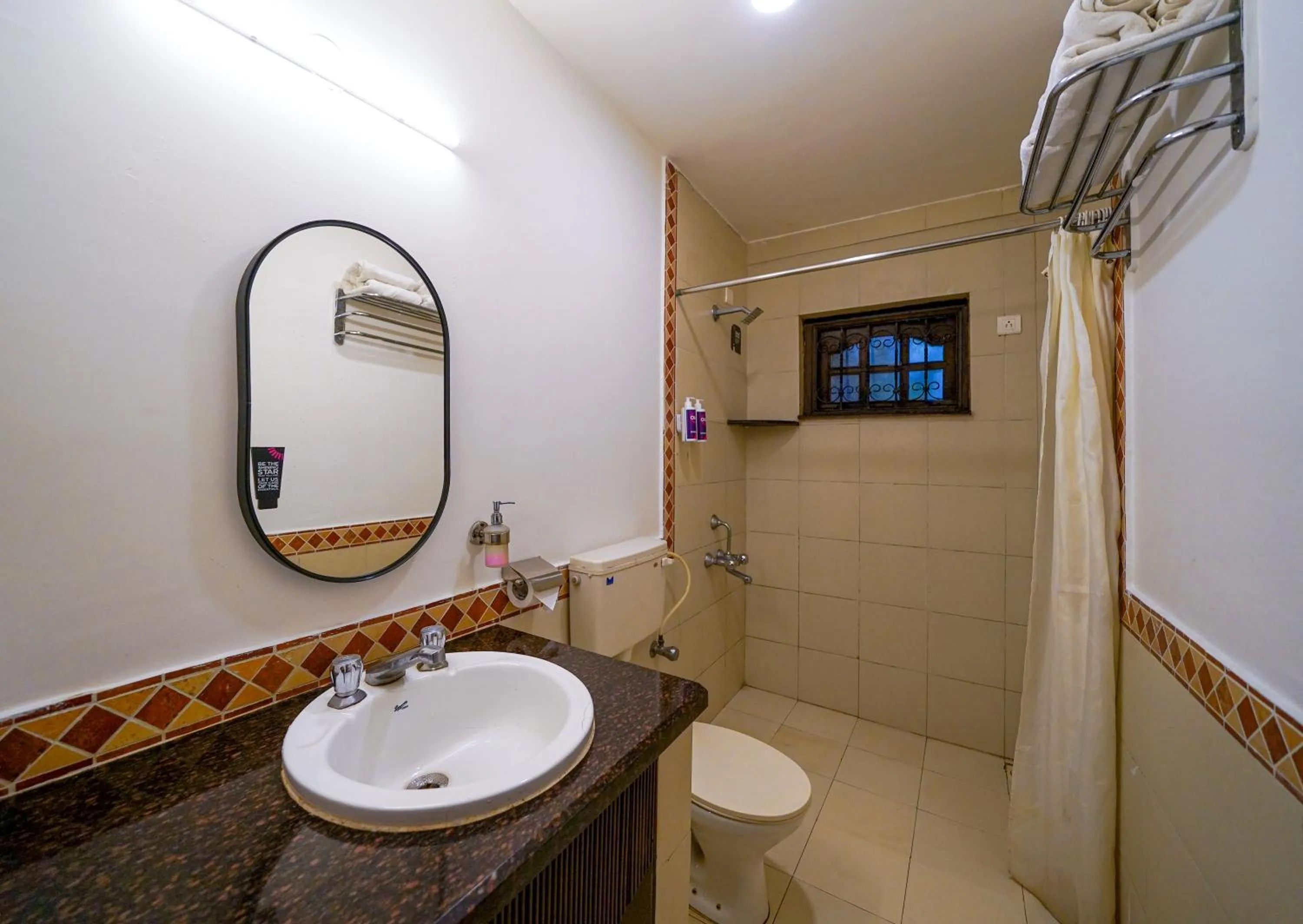 Shower in Olive Hotel Alidia Beach Resort by Embassy Group