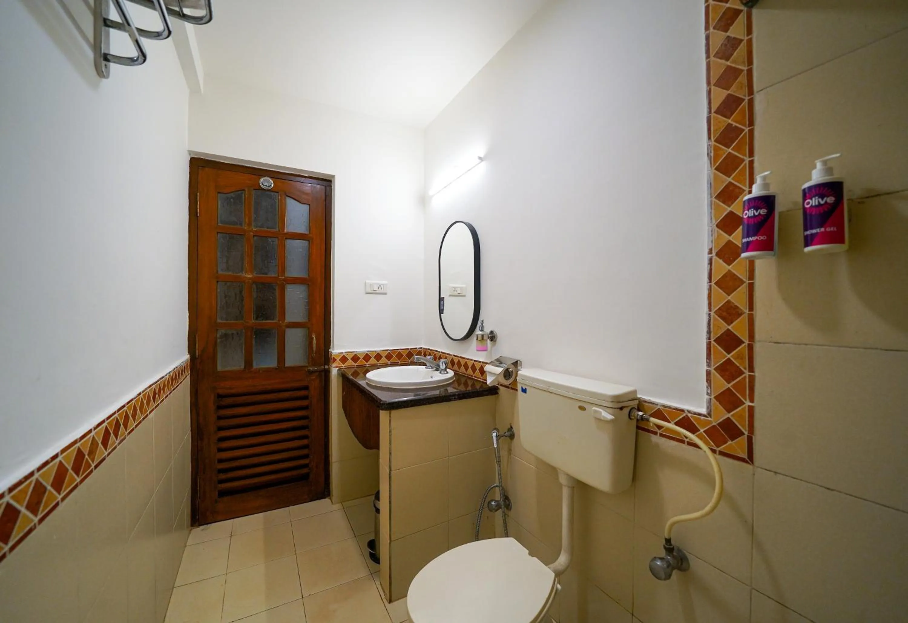 Toilet in Olive Hotel Alidia Beach Resort by Embassy Group