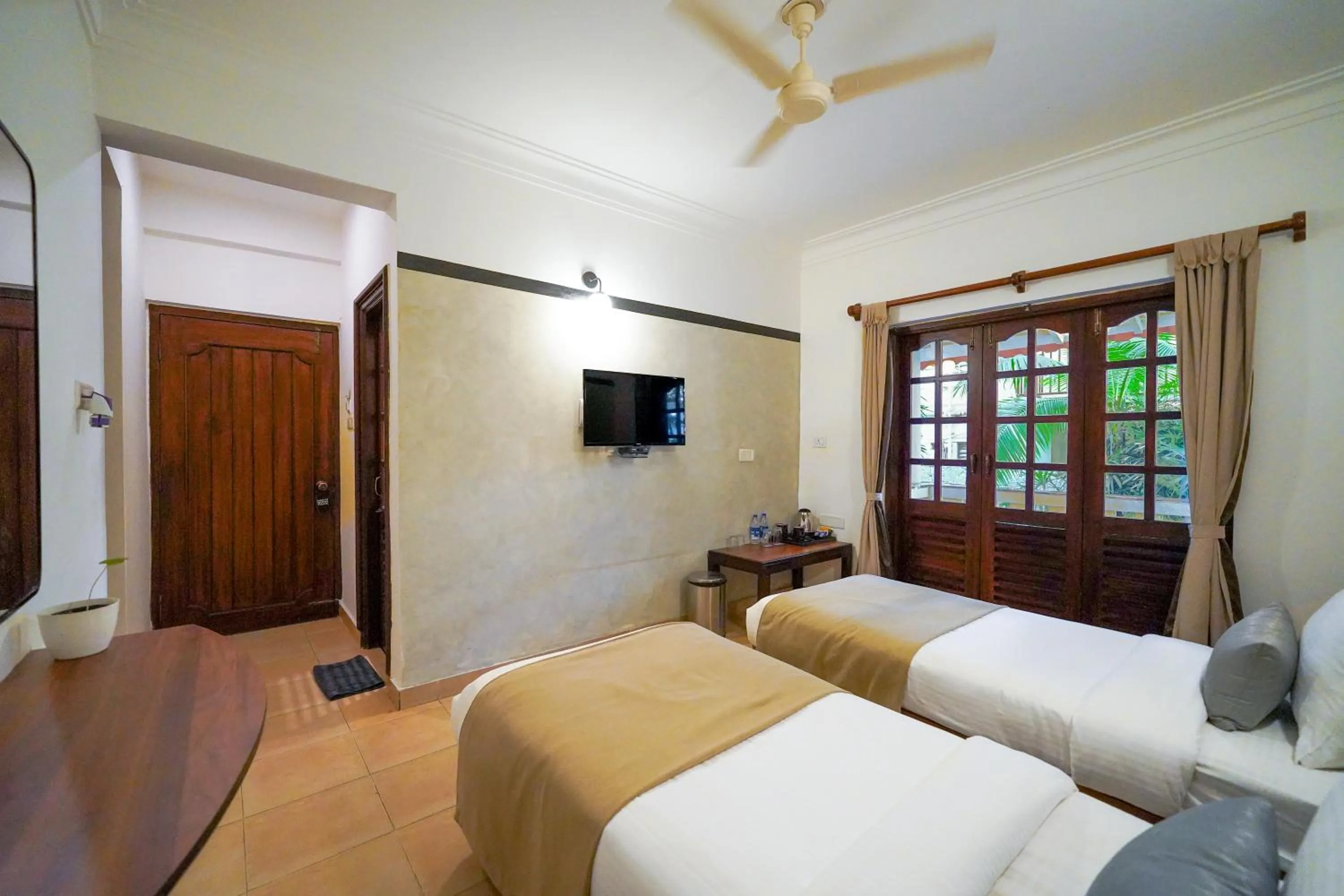 Bed in Olive Hotel Alidia Beach Resort by Embassy Group